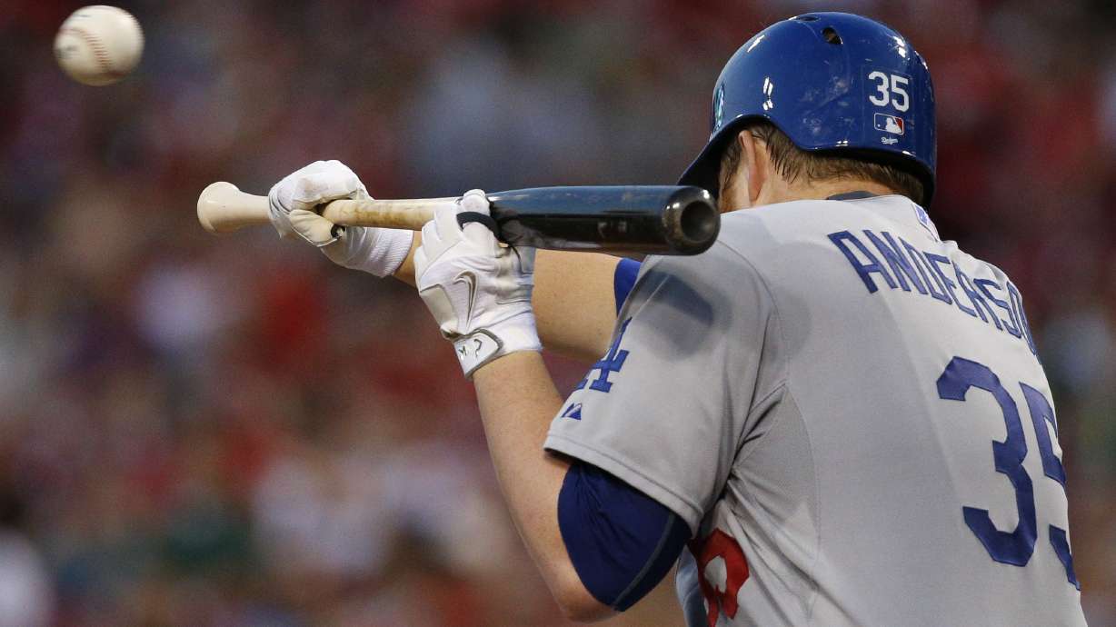 Dodgers ride 3 homers to 7-4 win over Reds