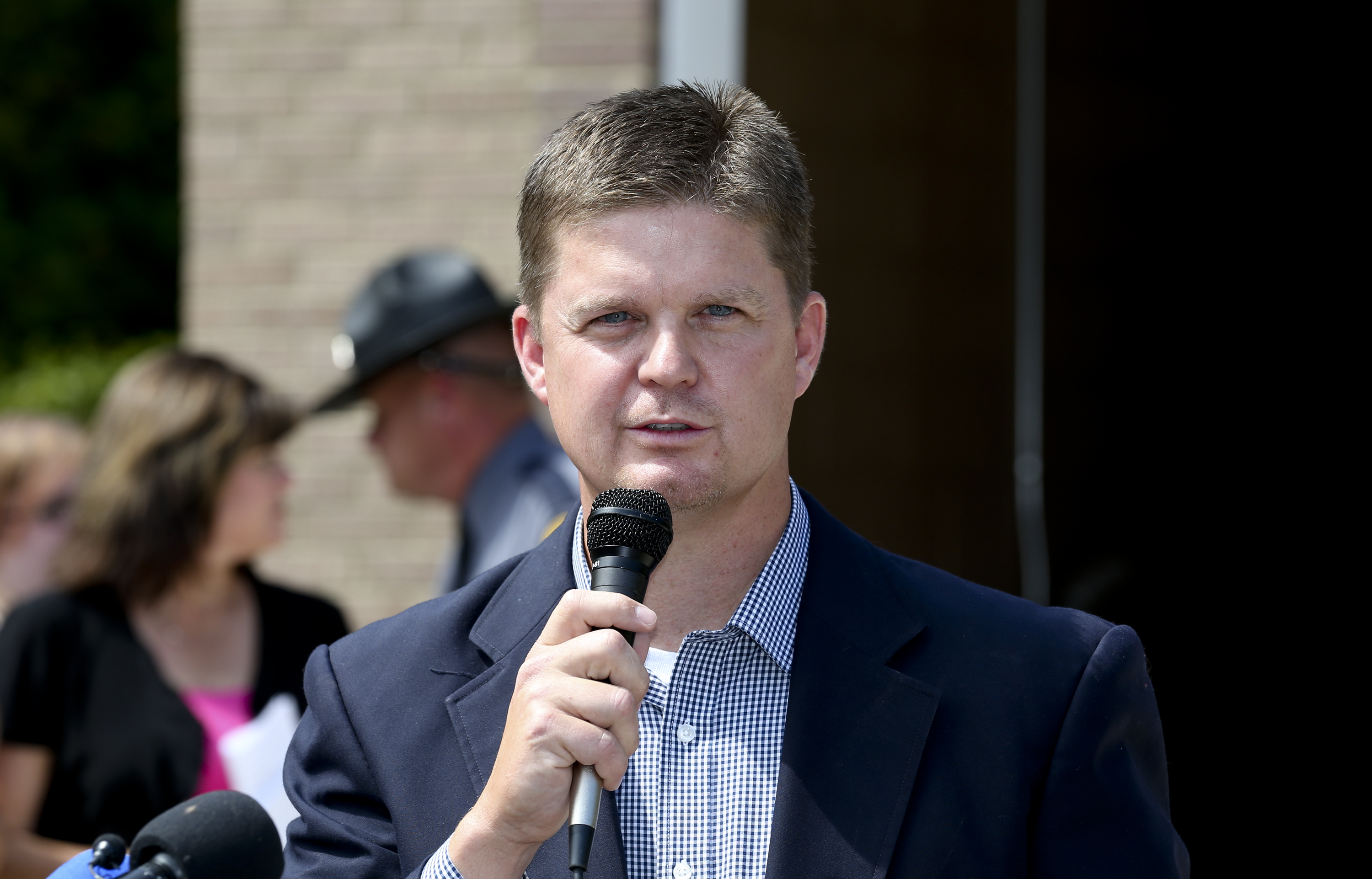 The Latest on TV shooting: AG joins hundreds for vigil