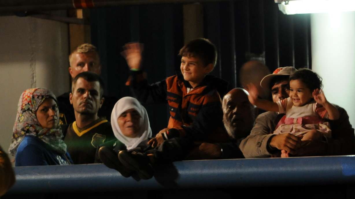 Refugees or migrants? Debate over words to describe crisis
