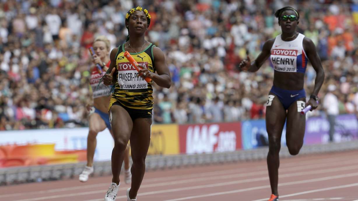 The Latest: US disqualified from men's 4x100 relay at worlds