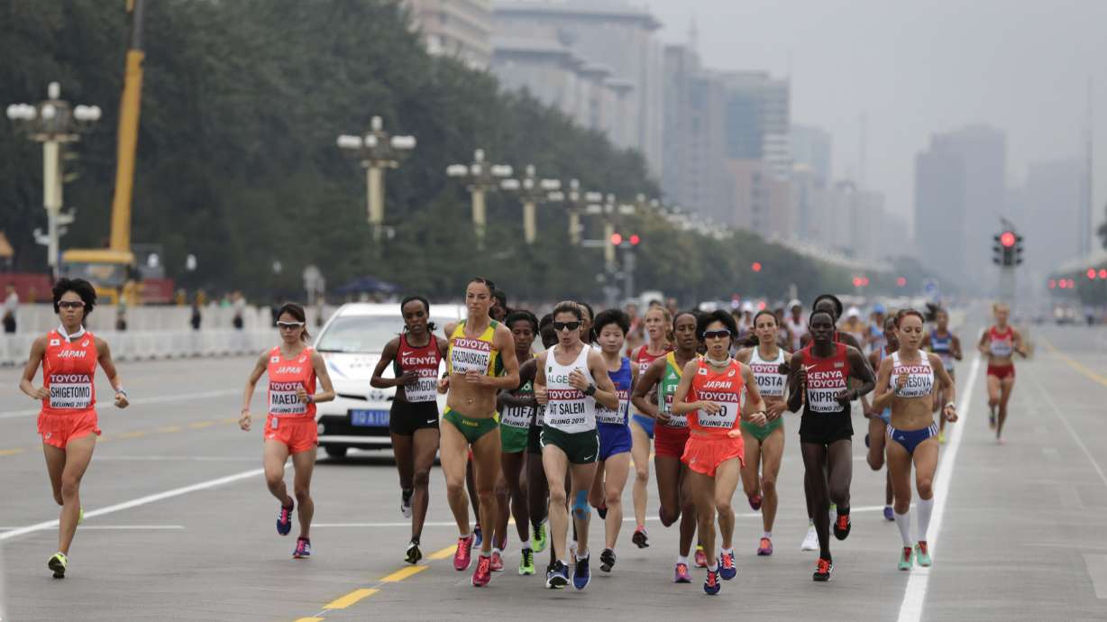 The Latest: Coe gets to work right away as IAAF president