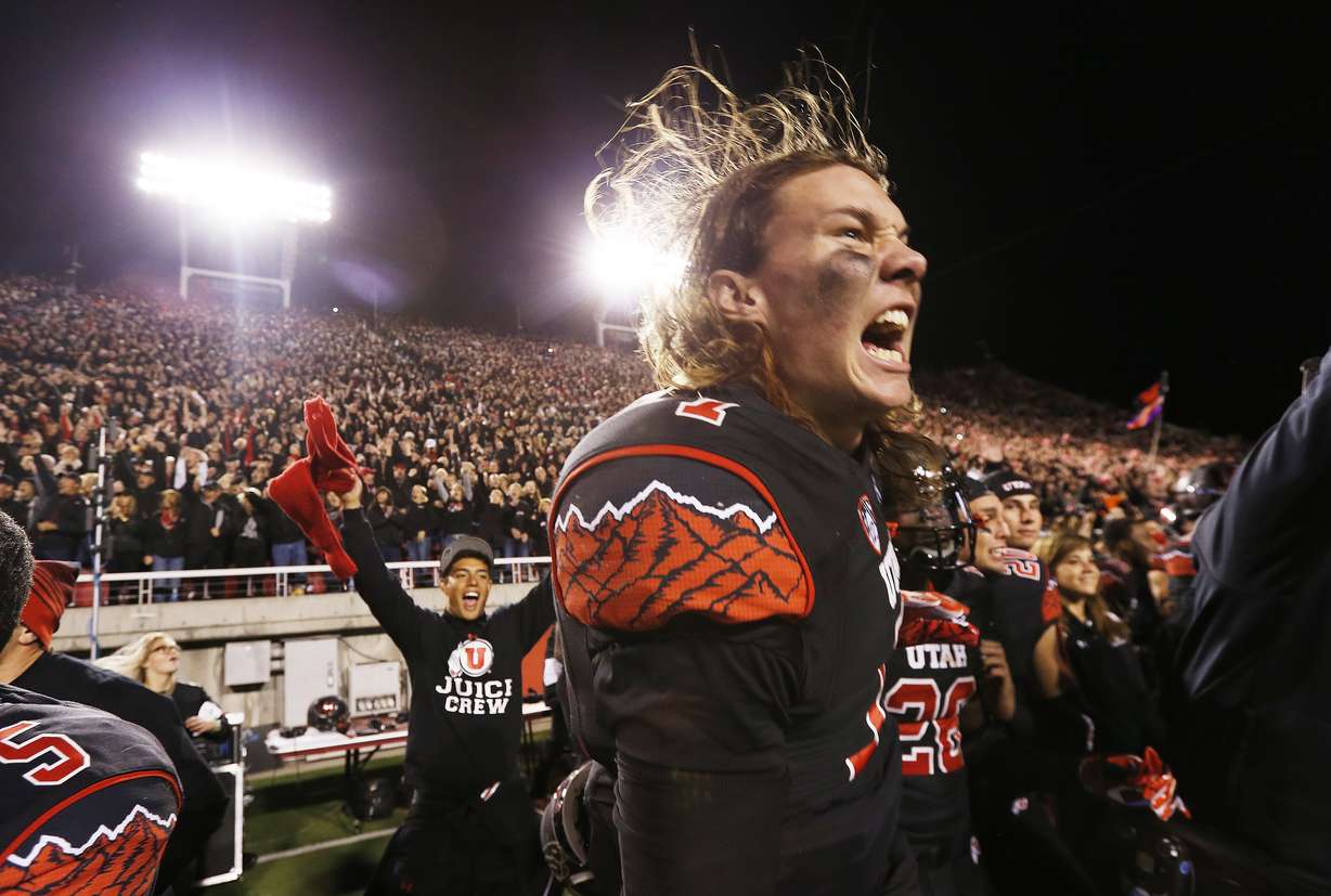 Utah Utes quarterback Travis Wilson (7) celebrates the win over USC during Pac-12 action in Salt Lake City Saturday, Oct. 25, 2014. Utah won 24-21. (Photo: Jeffrey D. Allred/Deseret News)