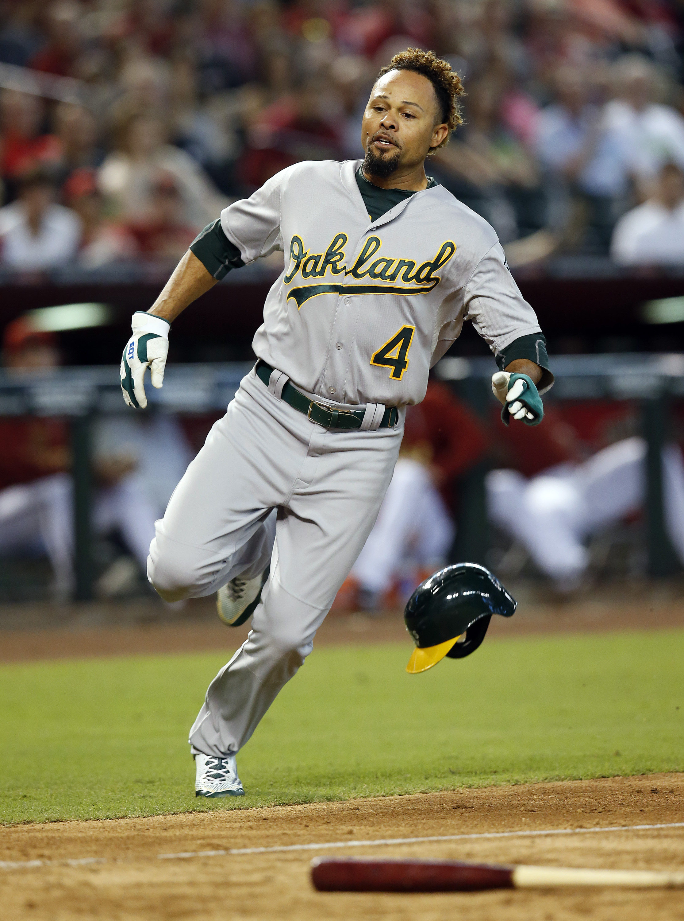 Switch-pitcher Venditte gets 1st win, A's top D-backs in 11
