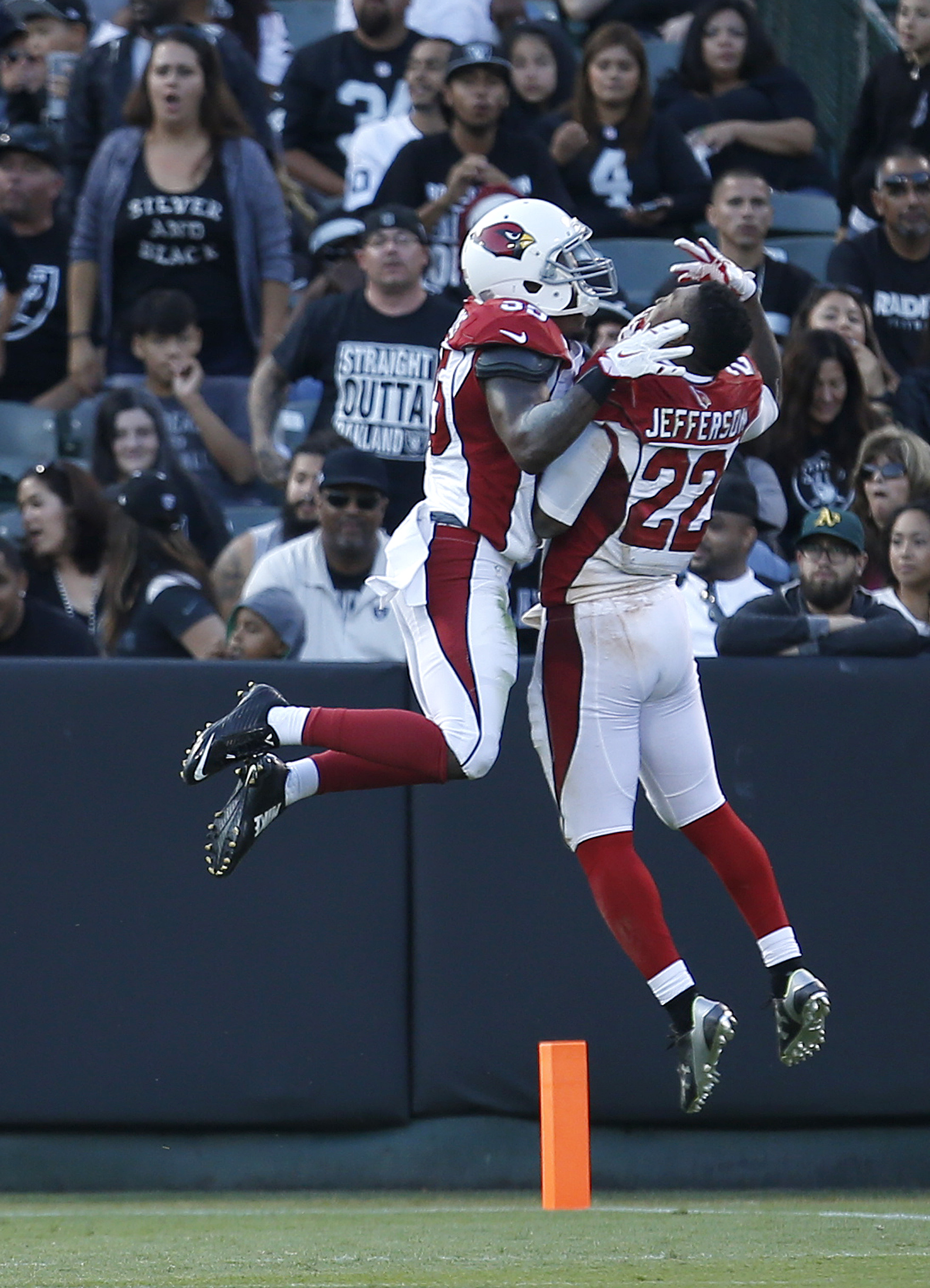 Starting offenses struggle, Cardinals beat Raiders 30-23