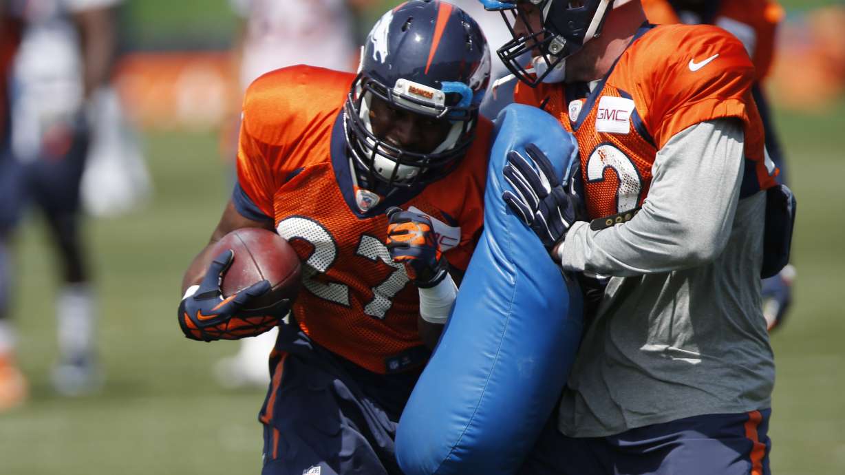 Broncos trade Clark, cut Walker, Stewart