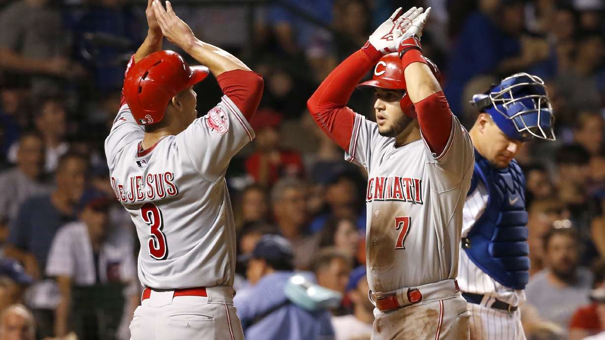 Reds power past Cubs as 4-run 6th leads to 13-6 win