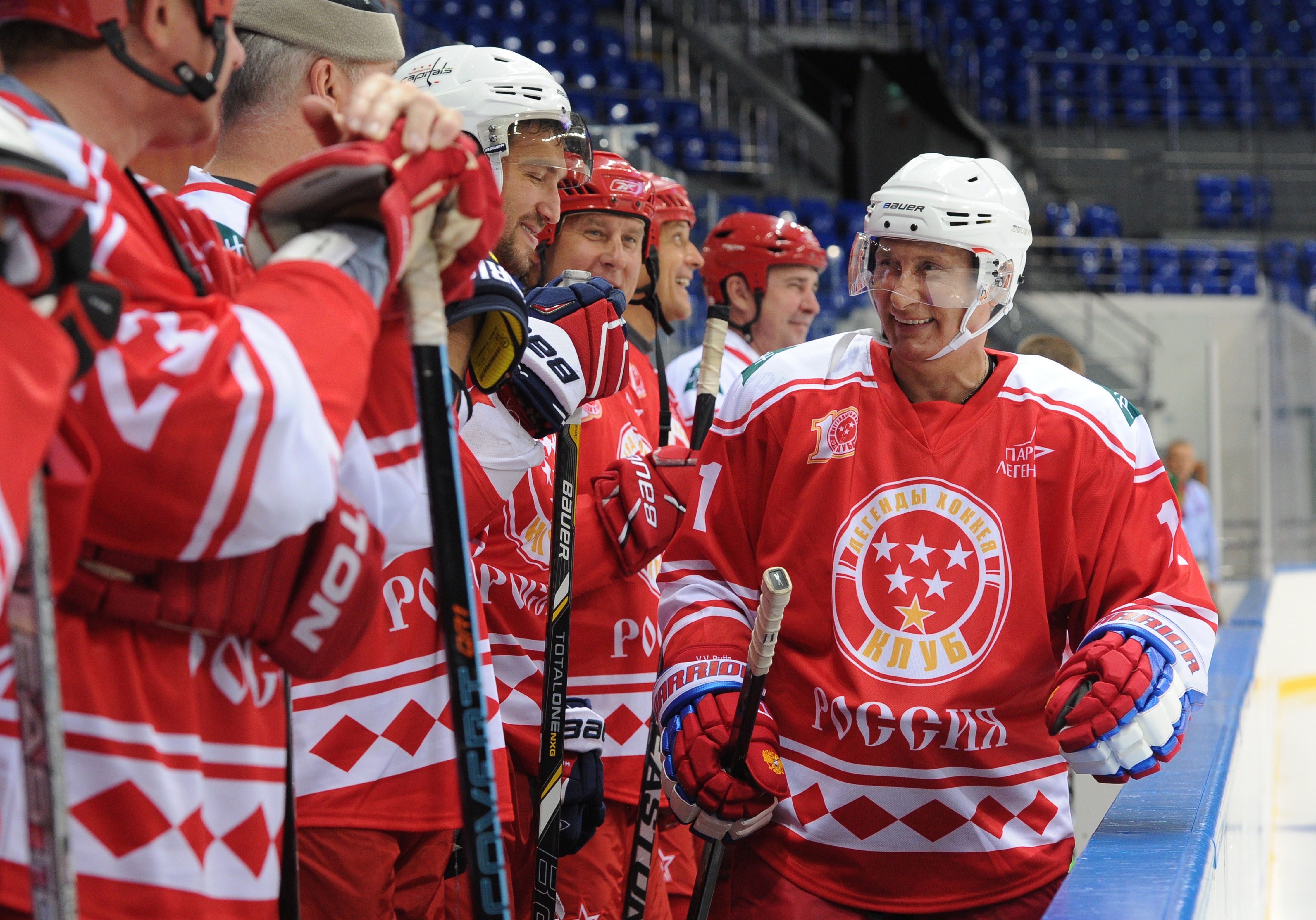 Putin takes part in hockey game against students in Russia