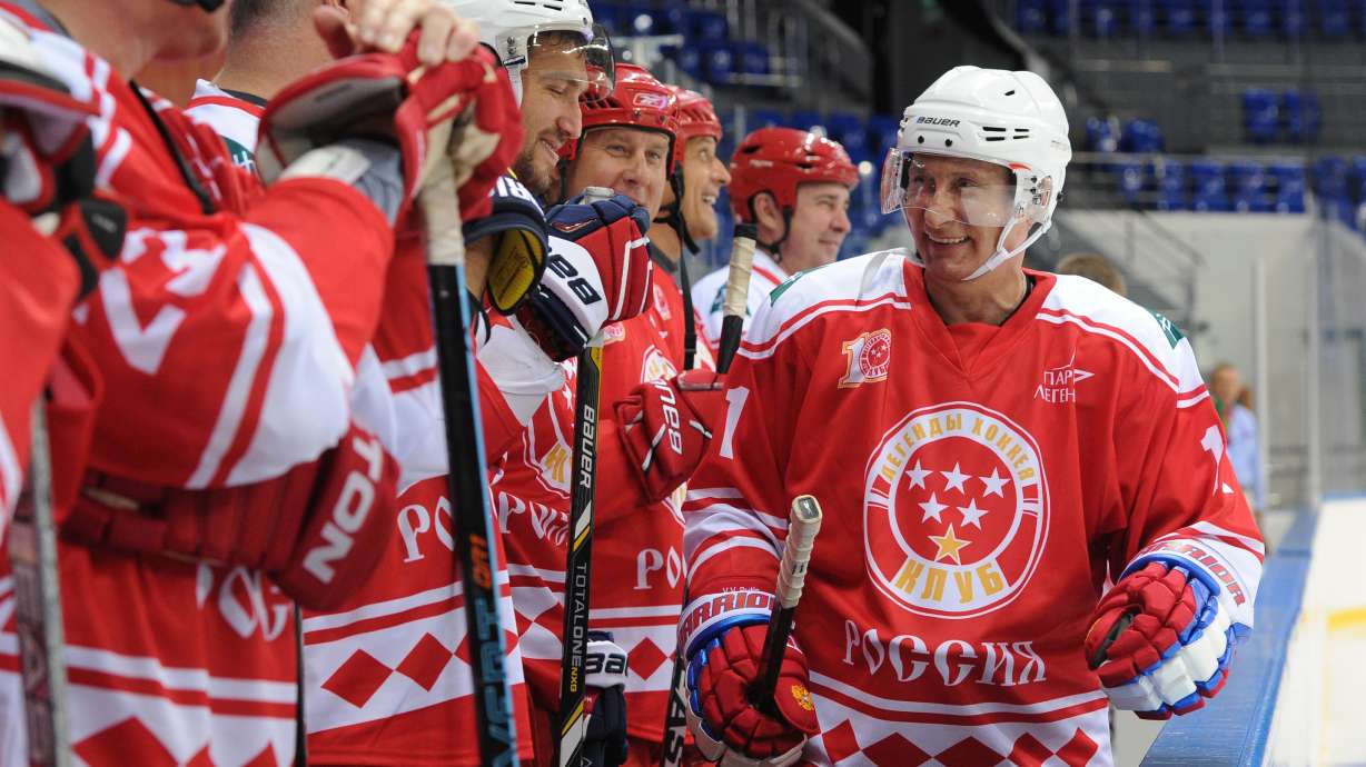 Putin takes part in hockey game against students in Russia