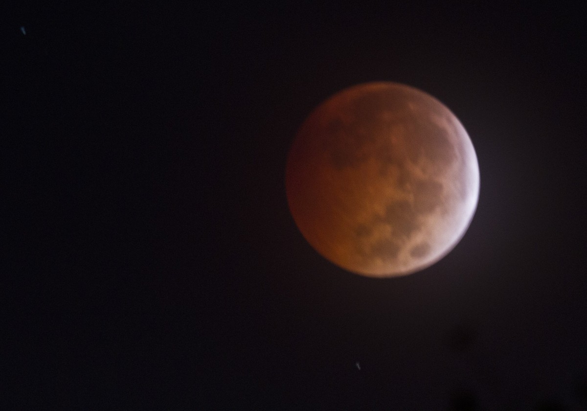 People throughout the United States had a front-row seat for "Blood Moon," a lunar eclipse that made the moon look a burnt reddish-orange. This eclipse, on October 8, 2014, was the second "Blood Moon" of 2014. (Photo: Wes Little/CNN)