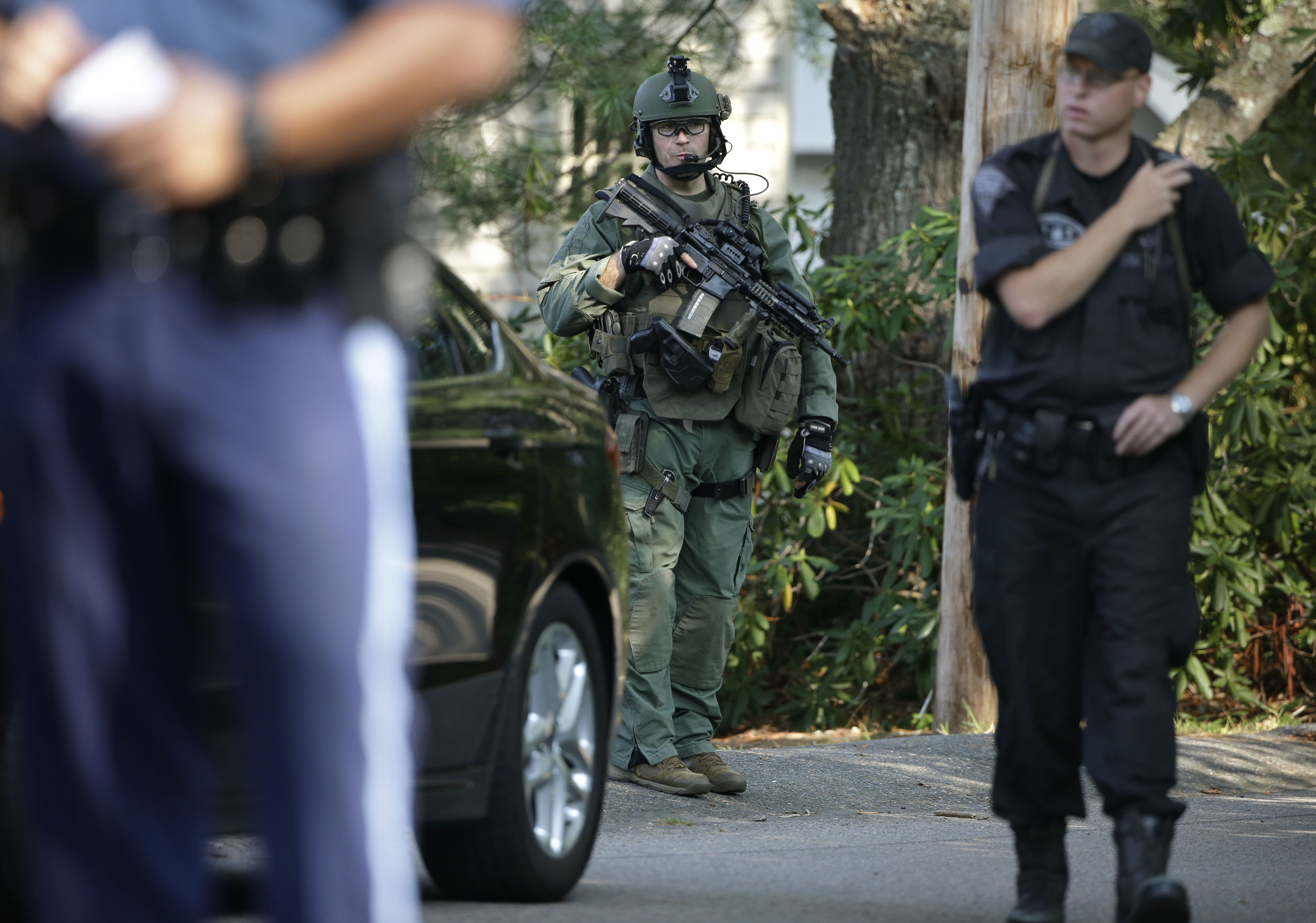 Police cruiser hit by gunfire, crashes, catches fire