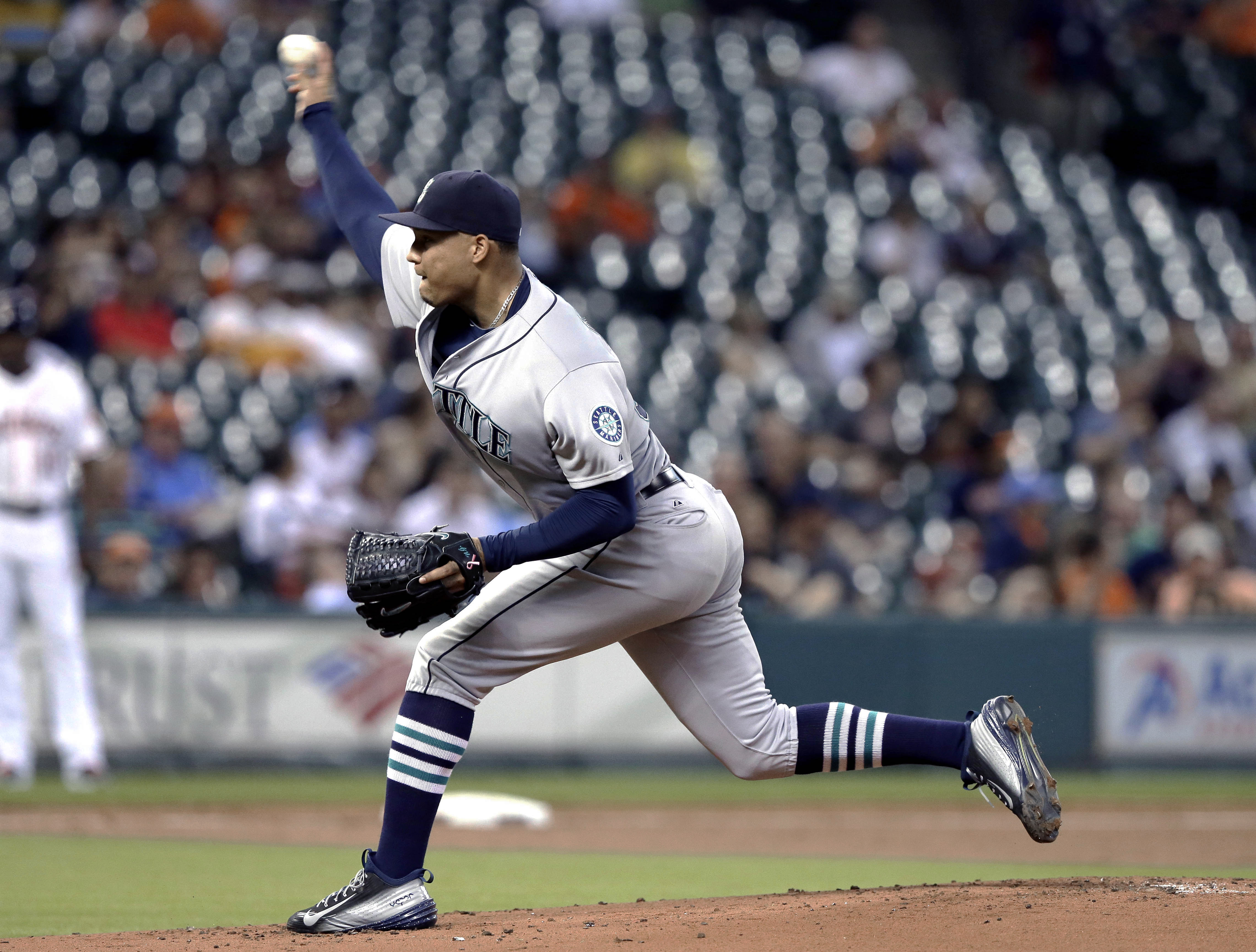 O'Malley, Morrison shine late, lift Seattle over Astros 8-3