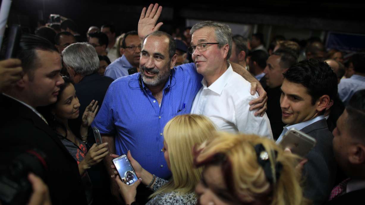 Clinton, Rubio court Puerto Rico voters as crisis looms