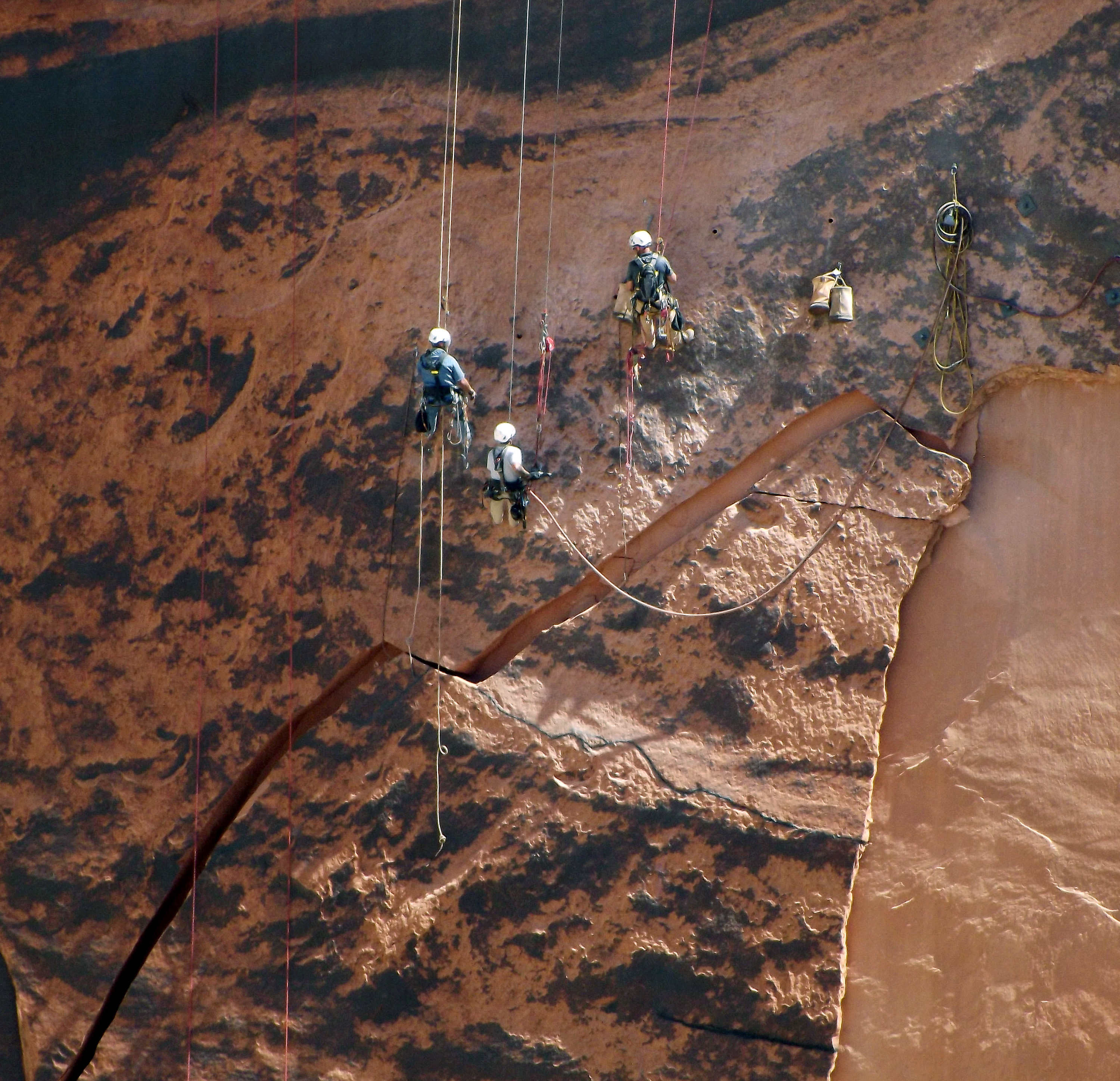 Massive rock threatening to crash into base of Glen Canyon Dam