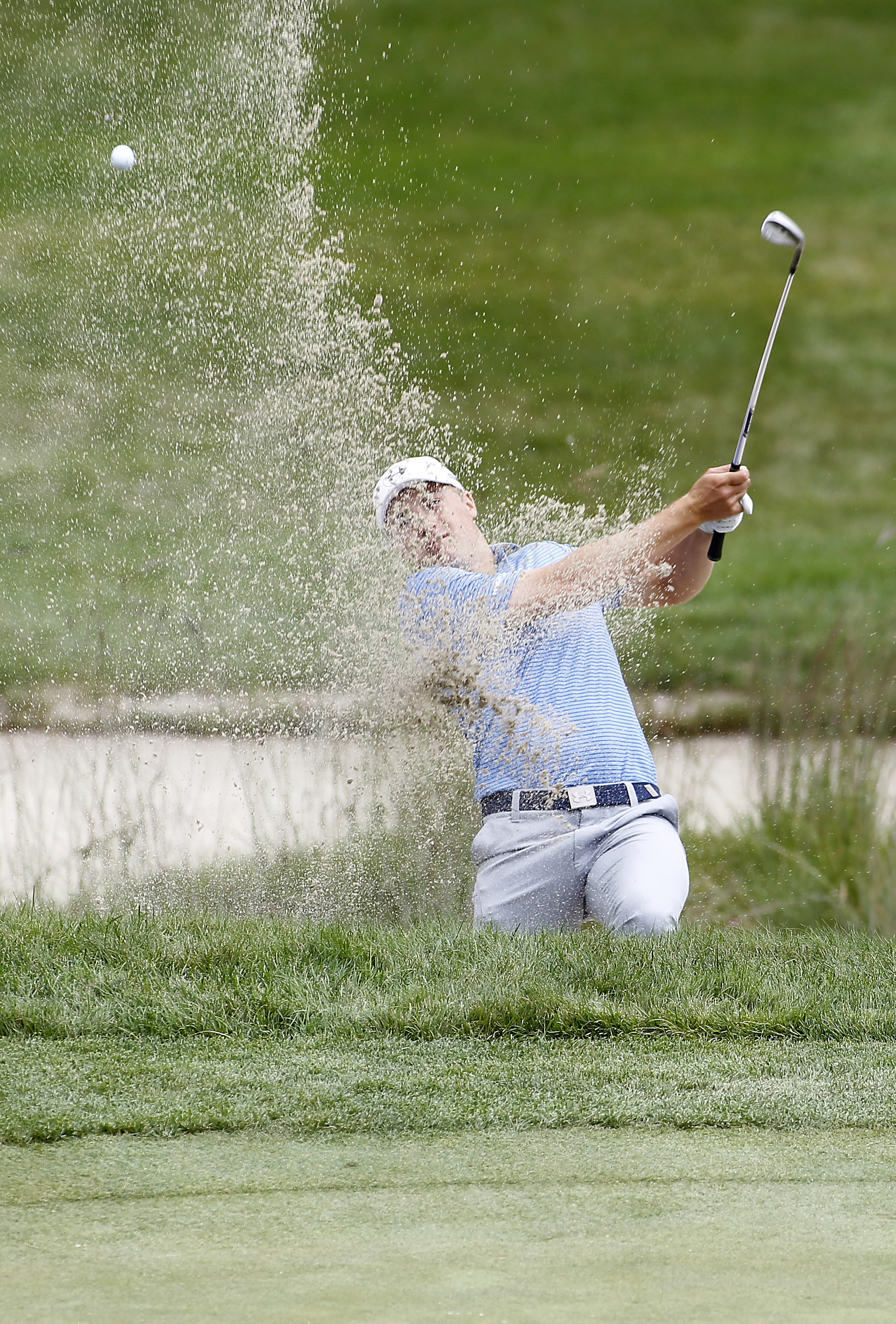 Day, Spieth rolling in opposite directions at TPC Boston