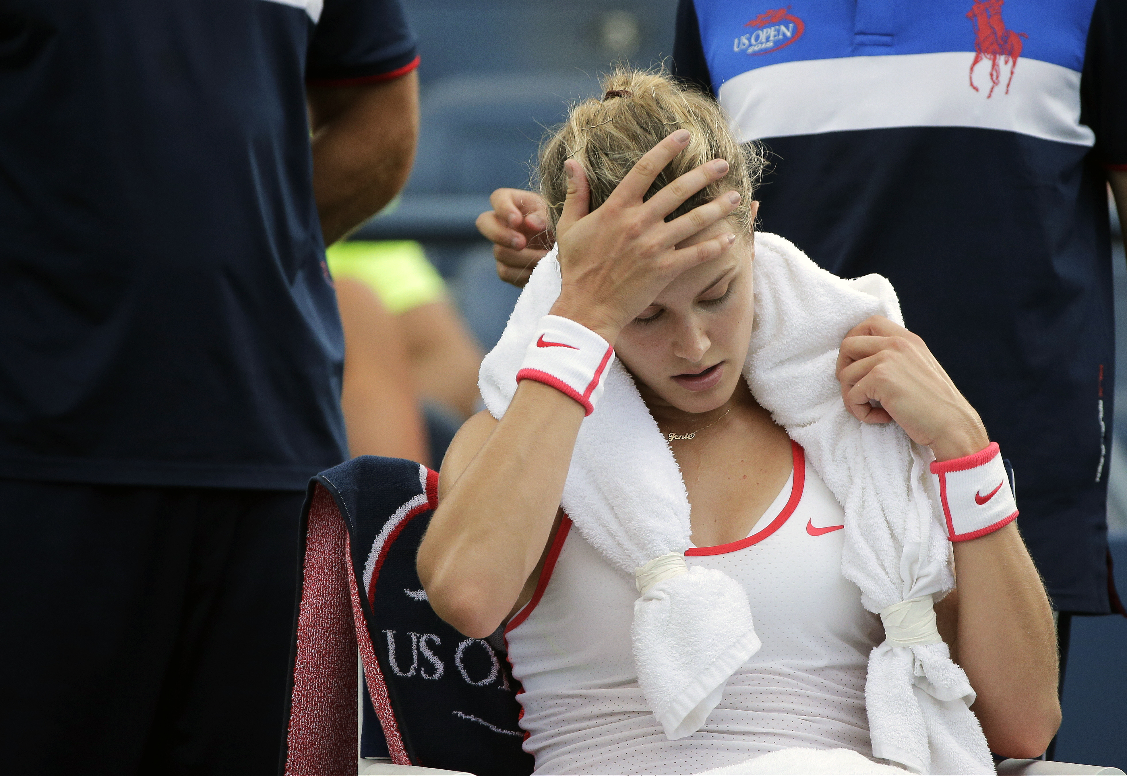 Bouchard hurts head in locker-room fall; out of Open doubles