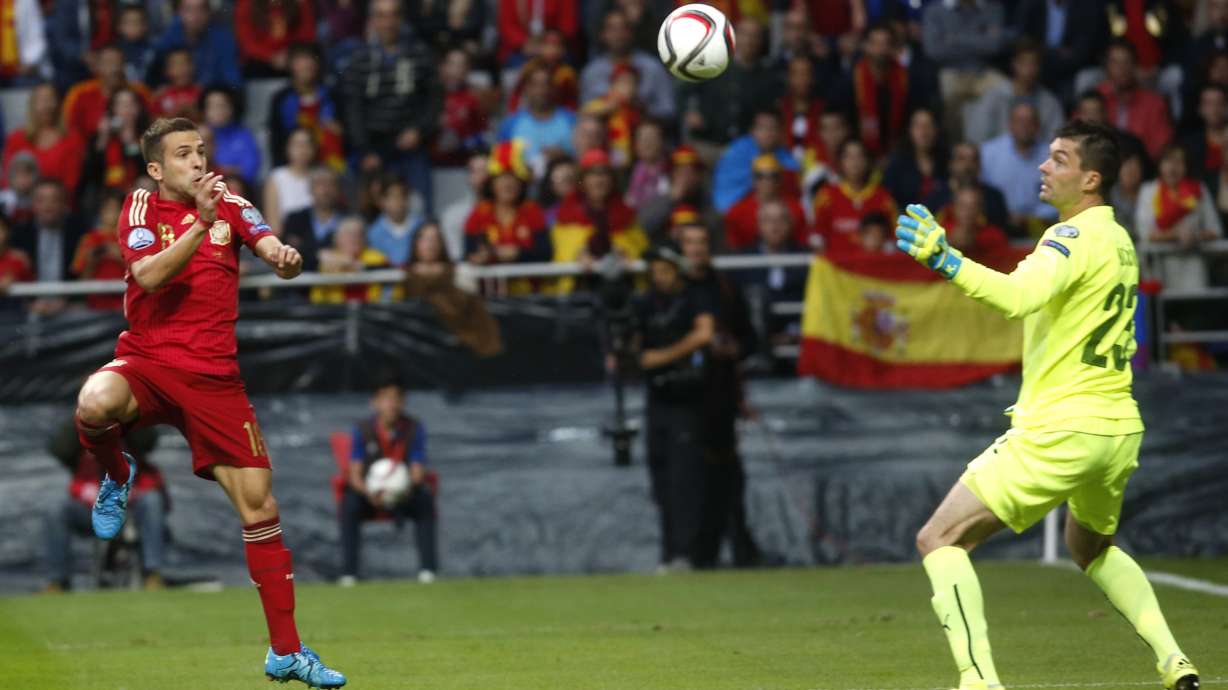 Spain beats Slovakia 2-0 to tighten race in Euro qualifying