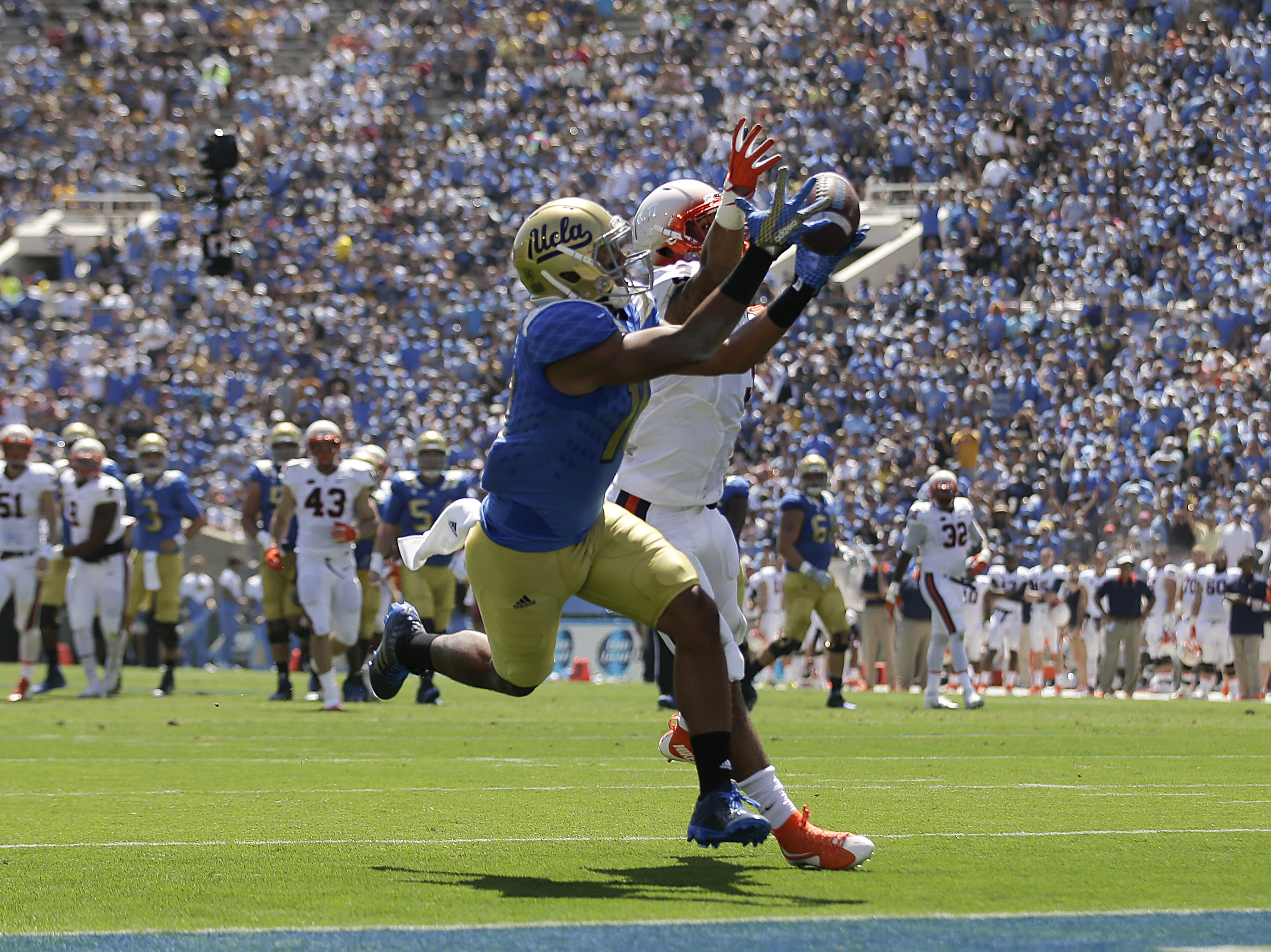 Rosen leads No. 13 UCLA past Virginia 34-16 in stellar debut