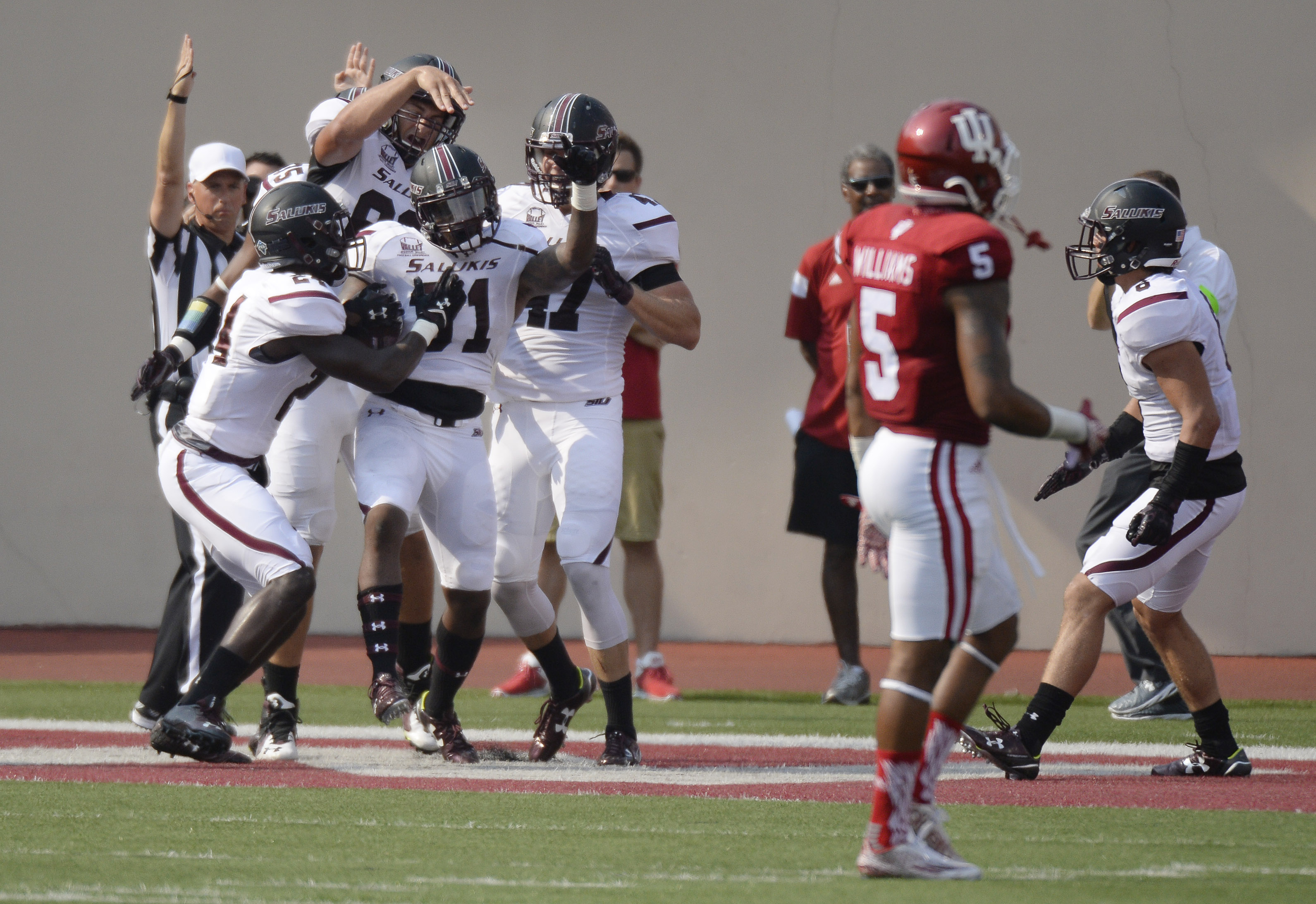 Howard's 3 TDs, late stop lift Indiana over S. Illinois