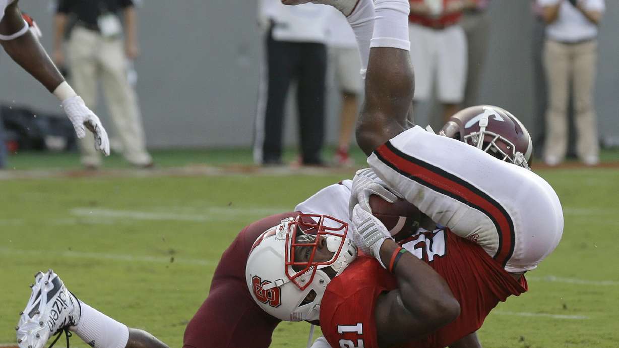 Dayes, Samuels help NC State roll past Troy 49-21 in opener