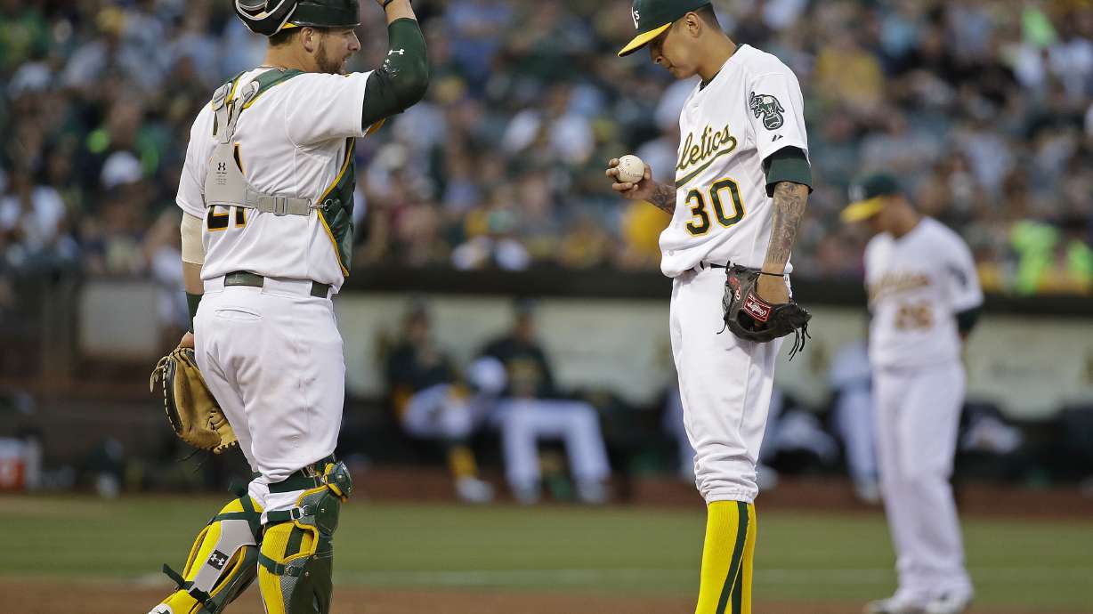 Hernandez, Cano lead Mariners to 8-3 win over A's