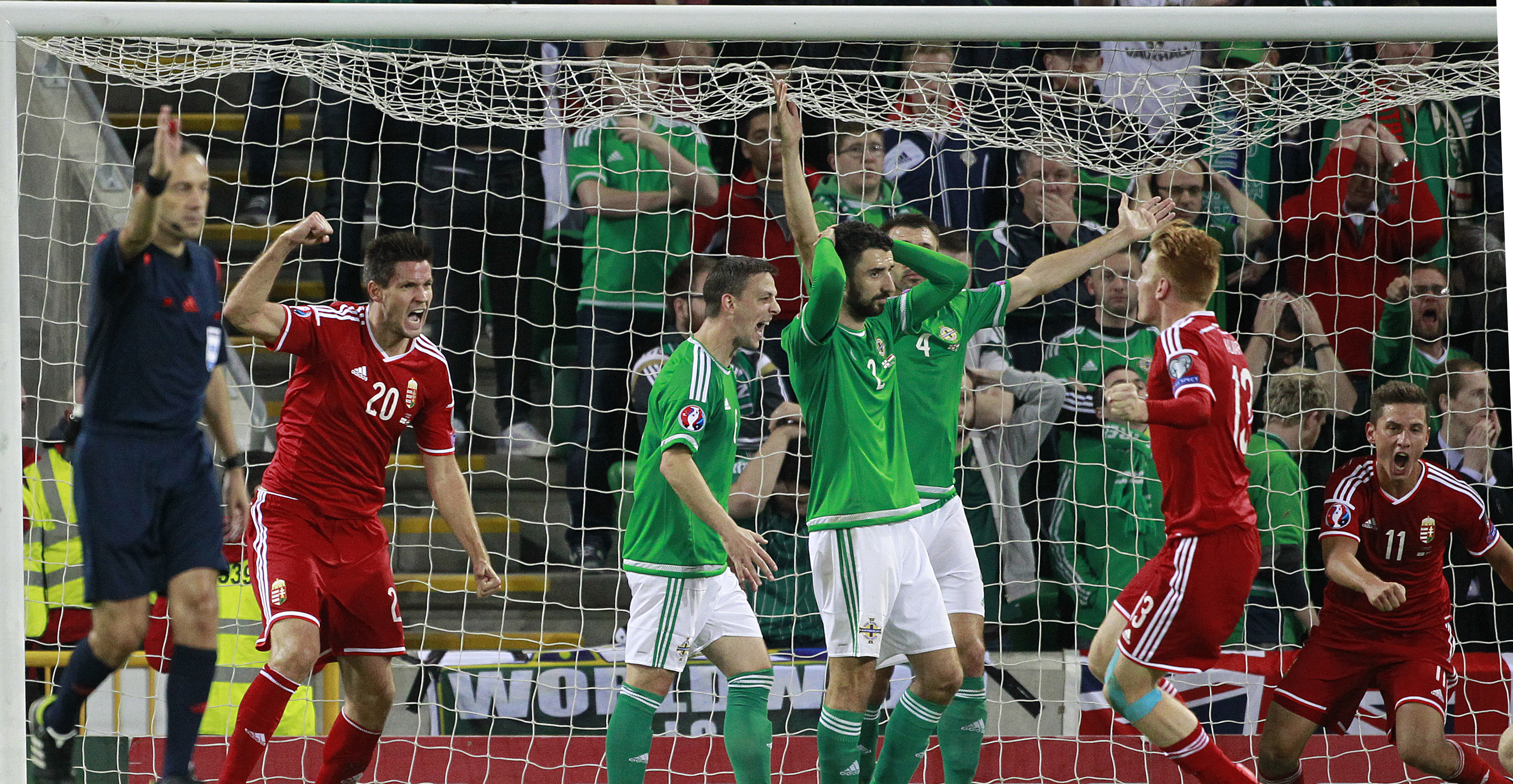 Northern Ireland, Romania stay on track for Euro 2016