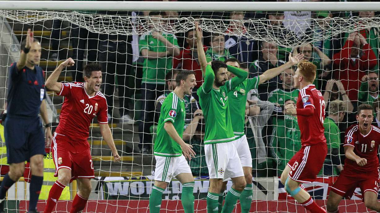Northern Ireland, Romania stay on track for Euro 2016
