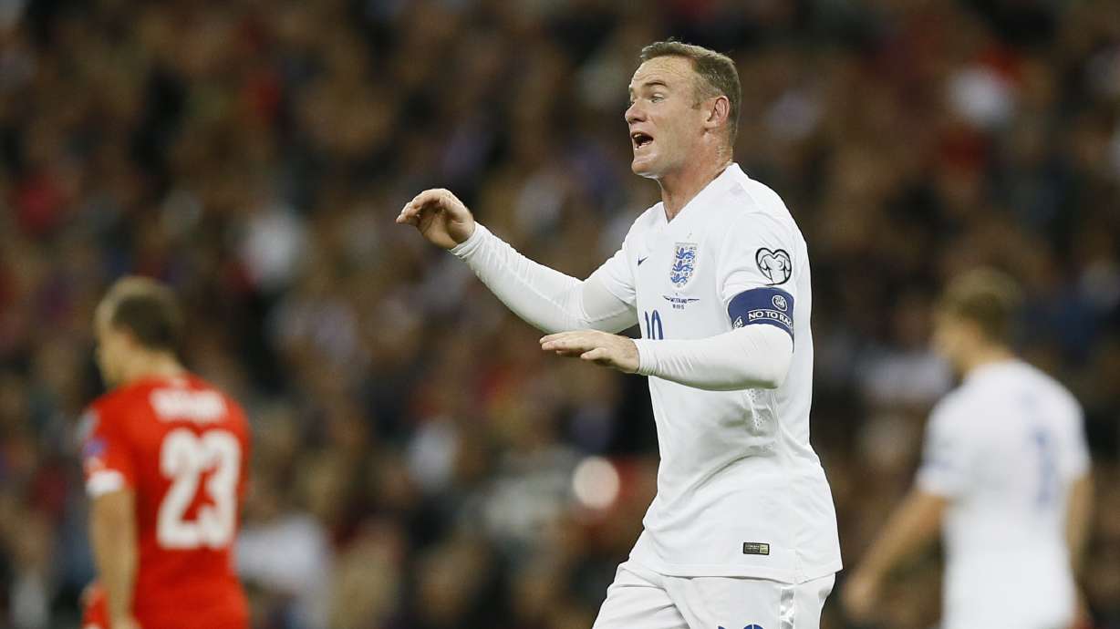 Rooney breaks England's scoring record with penalty
