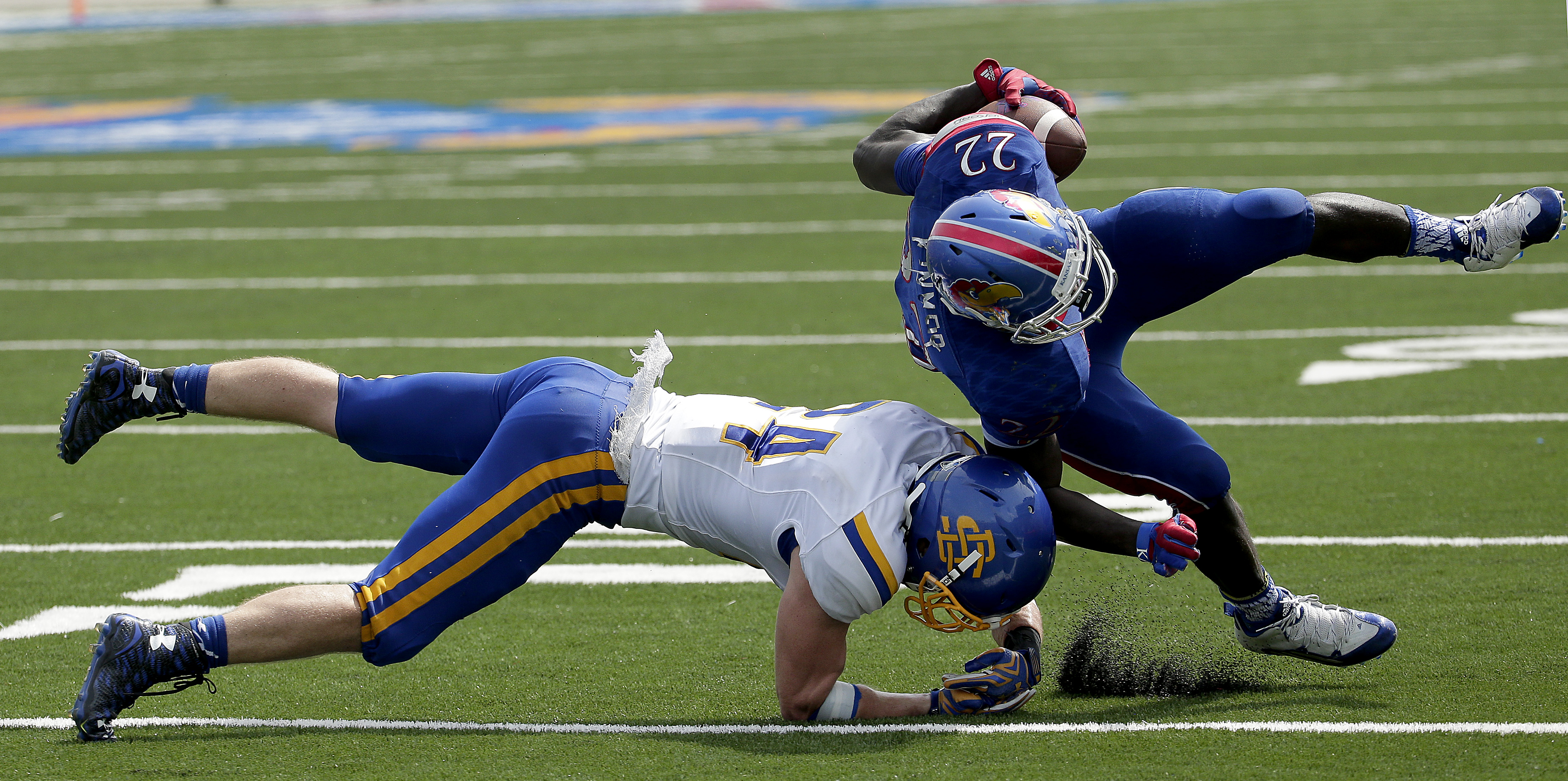 Jayhawks' 'air raid' offense produces Big 12's top rusher