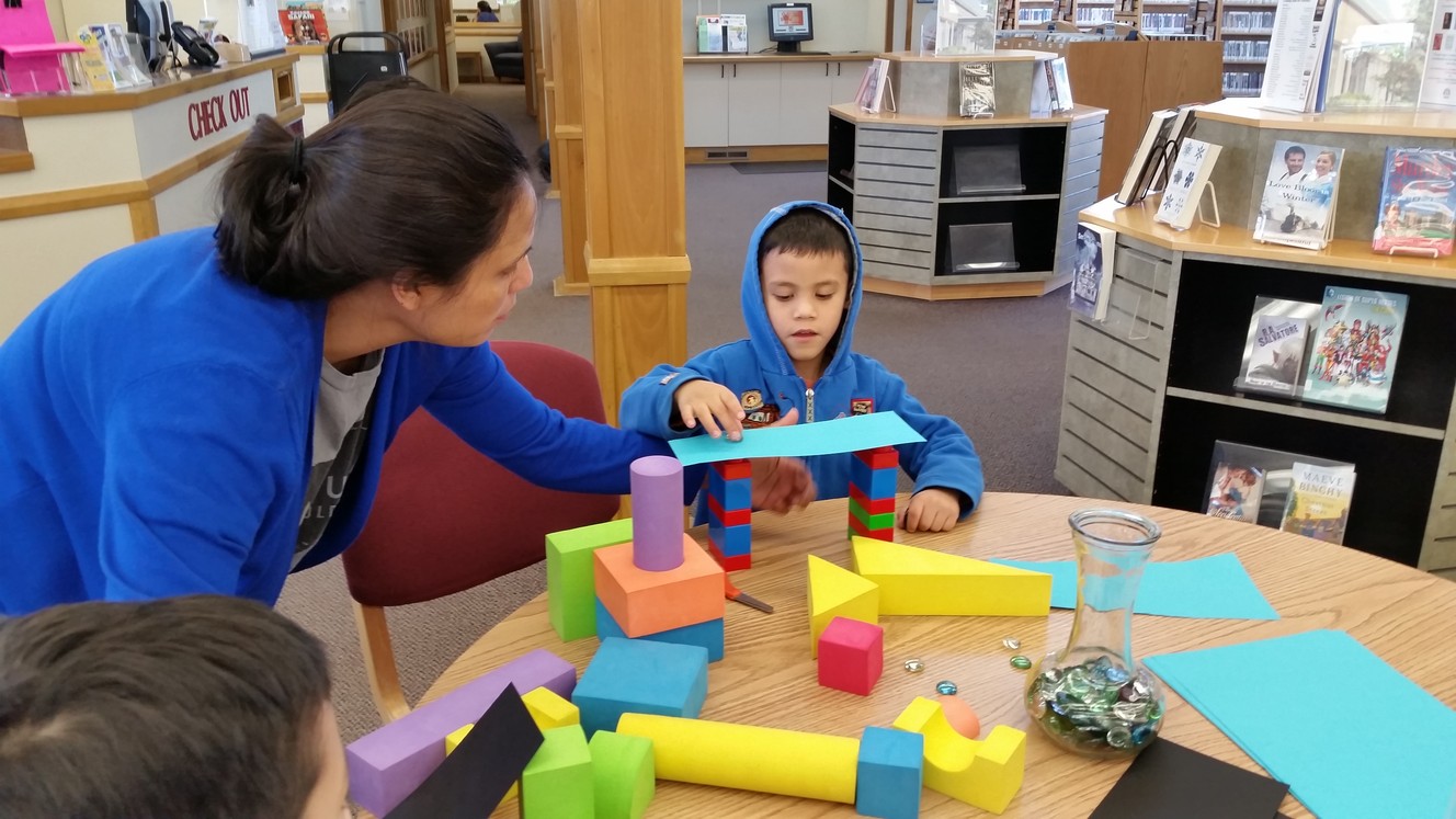 Children work on a block city. Photo: Jennifer McKague