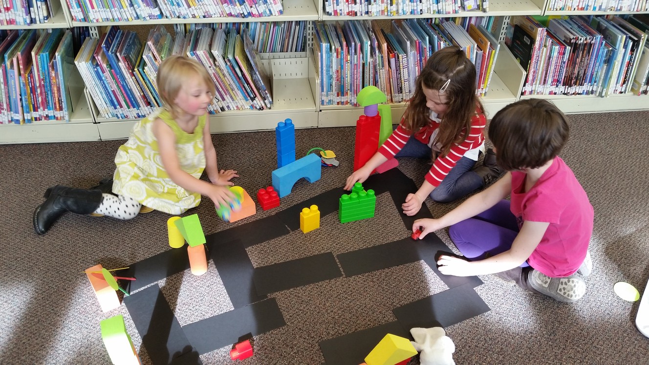 Children work on a block city. Photo: Jennifer McKague