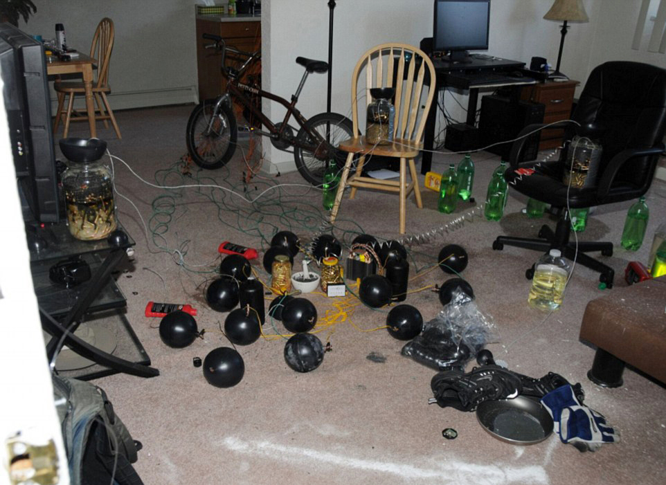 New photos show theater shooter's explosive booby traps