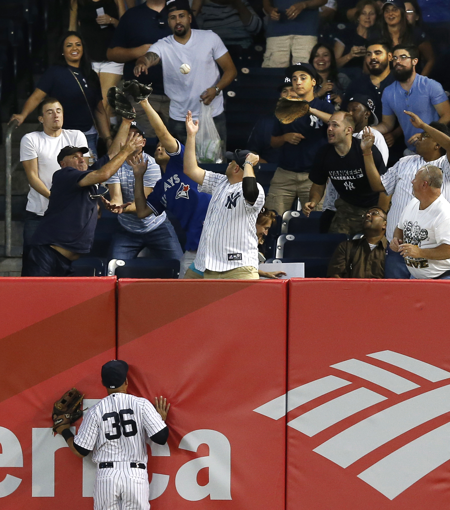 Fan stable and alert after fainting at Yankees game