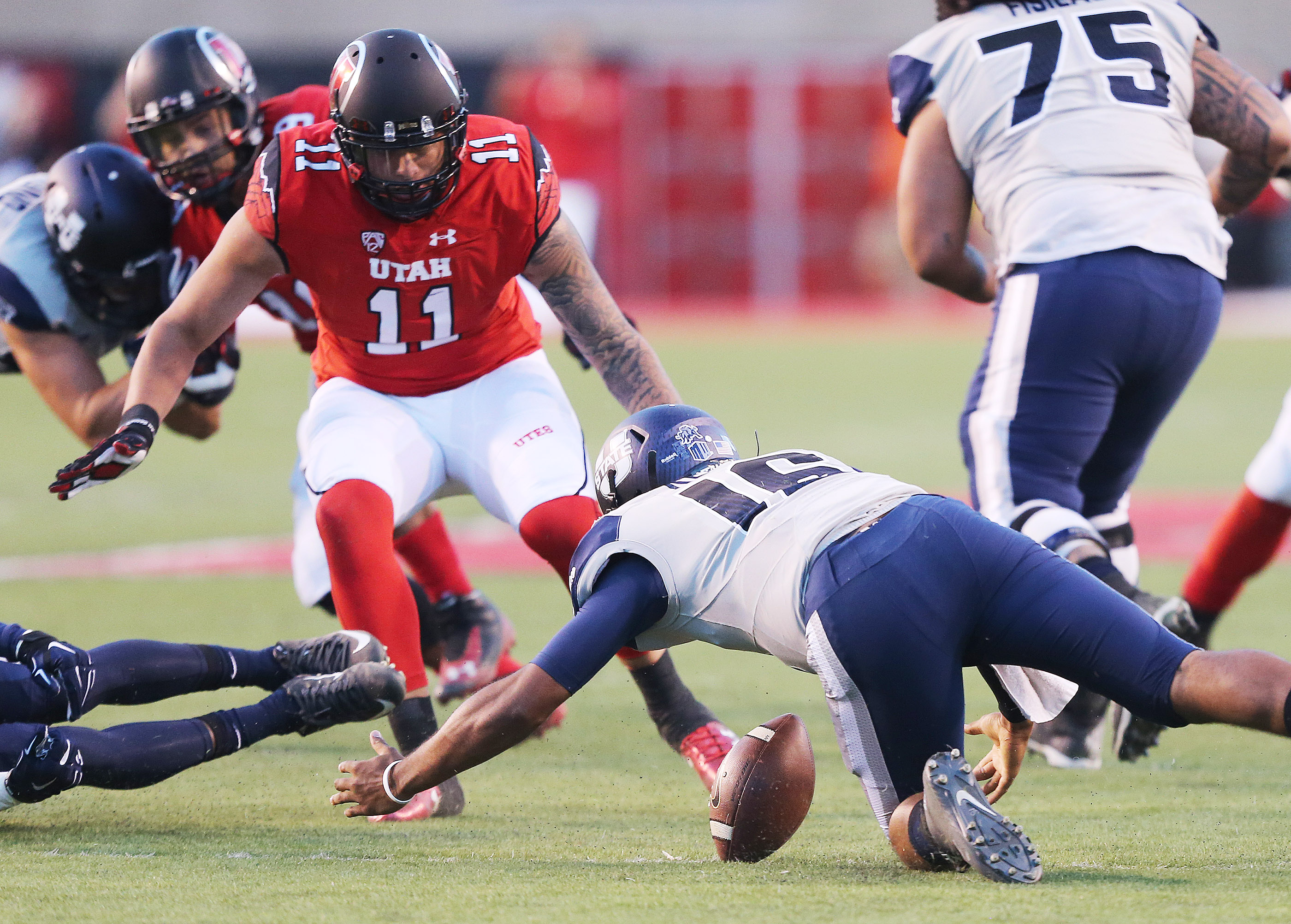 Utah State Aggies quarterback Chuckie Keeton (16) tracks down a muffed snap in Salt Lake City Friday, Sept. 11, 2015. Utah won 24-14. (Photo: Jeffrey D. Allred/Deseret News)