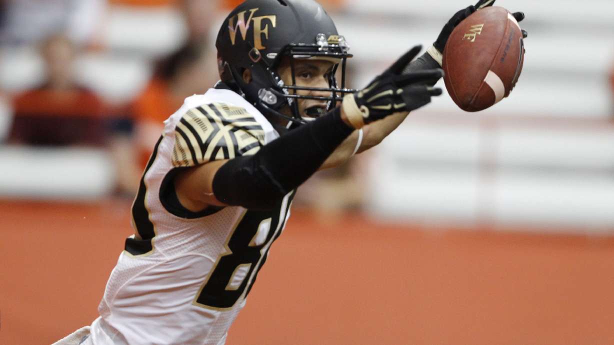 Dungey leads Syracuse past Wake Forest 30-17