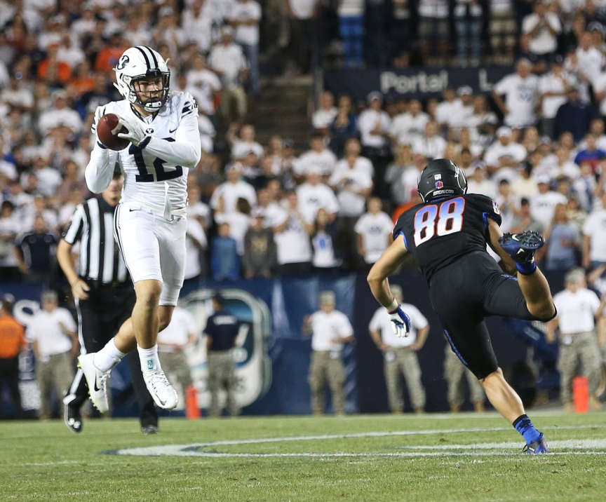 Kai Nacua (12) makes an interception and runs it back for a touchdown as BYU and Boise State play Saturday, Sept. 12, 2015, at LaVell Edwards Stadium in Provo. BYU won 35-24. (Photo: Scott G Winterton, Deseret News)