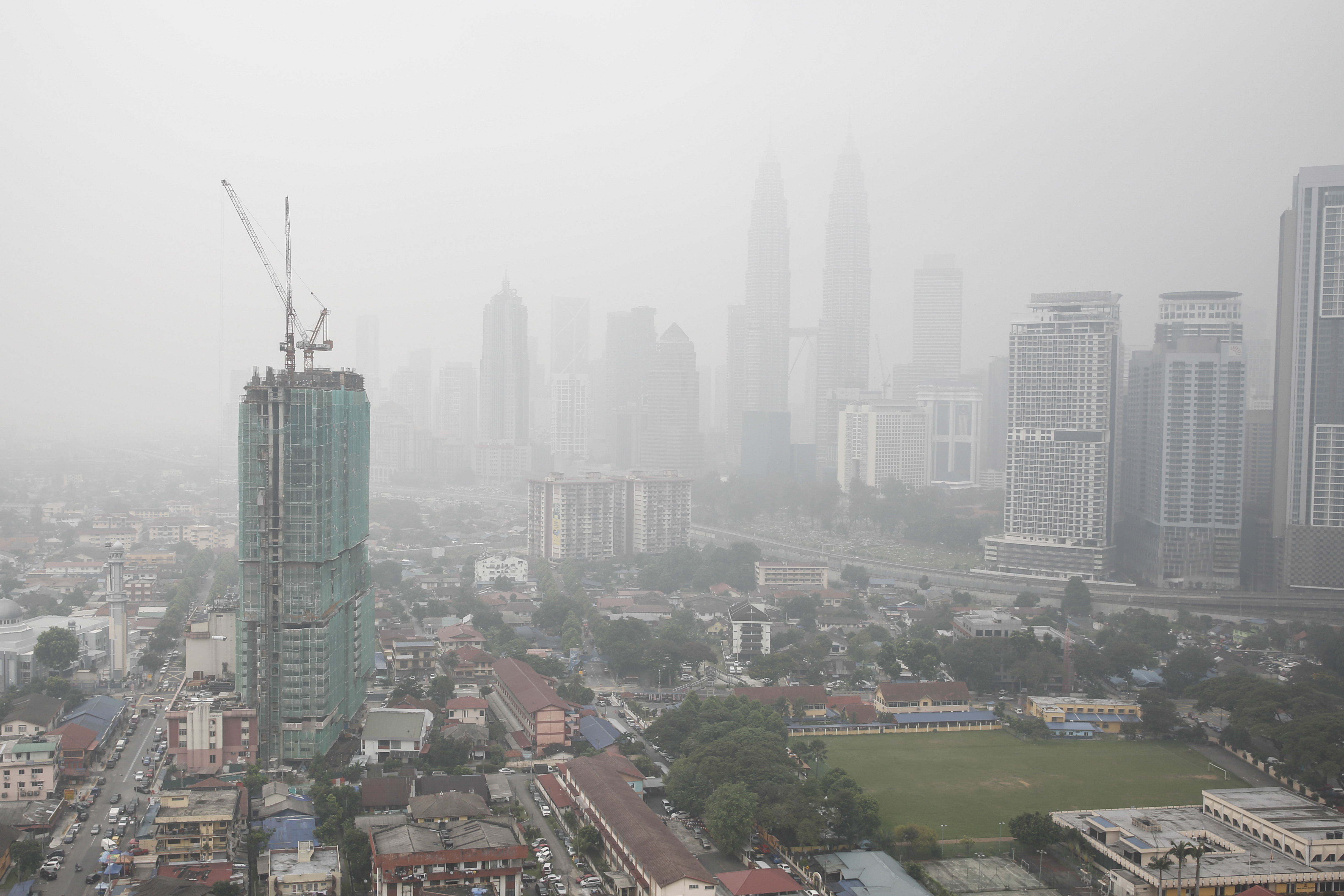 Malaysia to begin cloud-seeding as schools shut due to haze