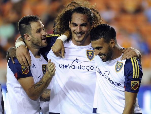 Real Salt Lake's Juan Manuel Martinez, Devon Sandoval andJavier Morales celebrate a 3-1 win over Houston Dynamo. (AP Photo/Eric Christian)