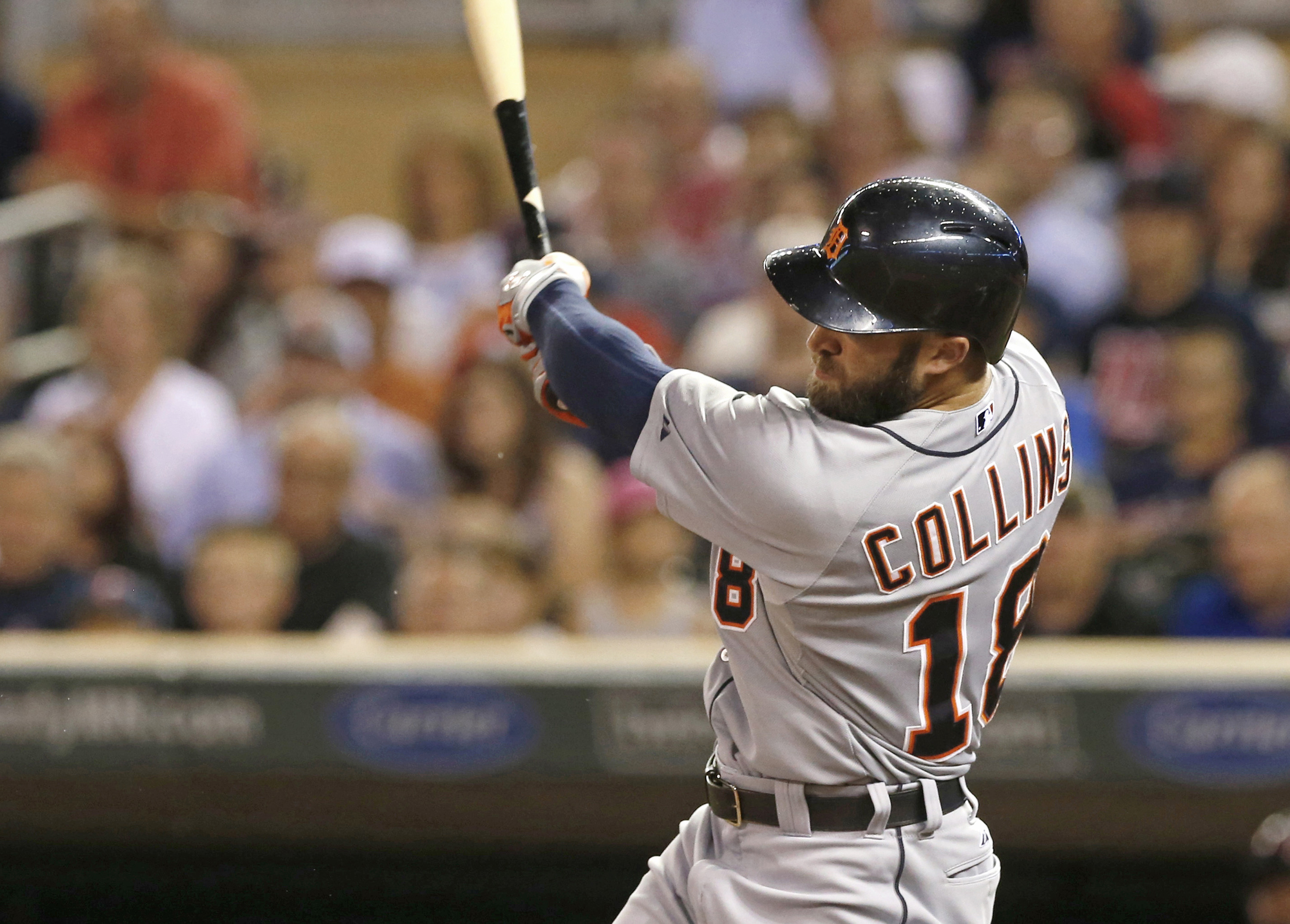 Martinez, Tigers outlast Twins 7-4 in 12 innings