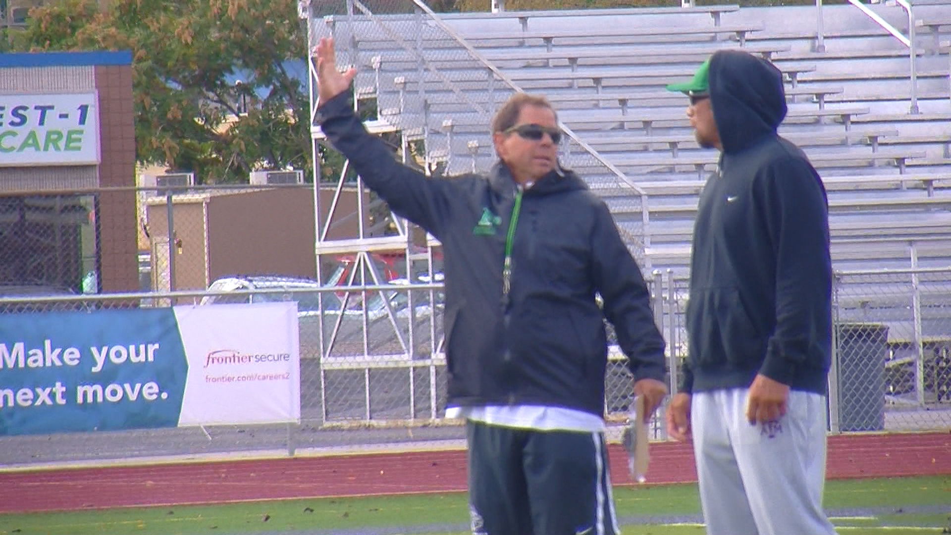 Provo coach Tony McGeary draws out a play in practice at Provo High School on Wednesday, Sept. 16, 2015. (KSL TV)