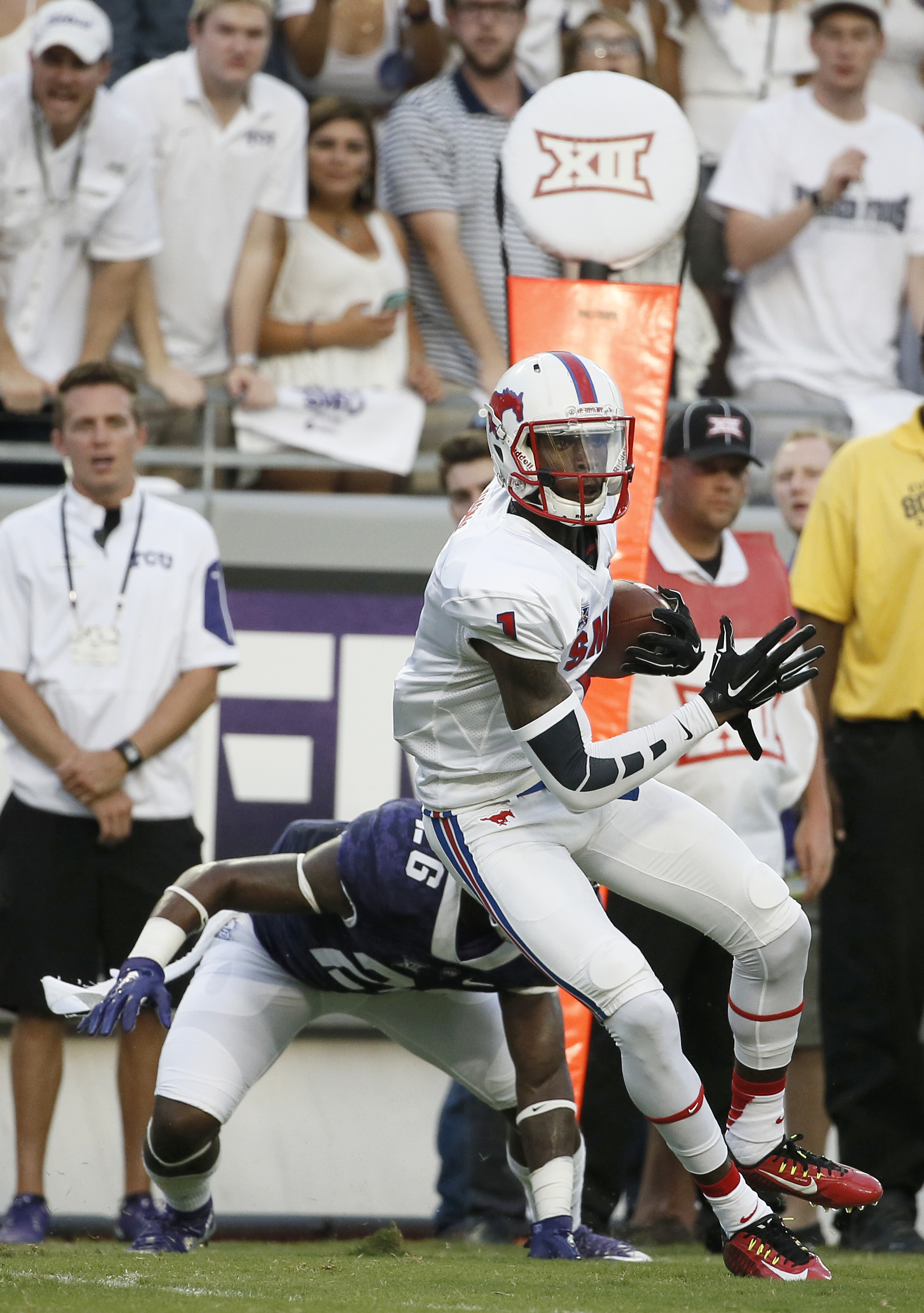 Boykin accounts for 6 TDs, No. 3 TCU holds on 56-37 vs. SMU