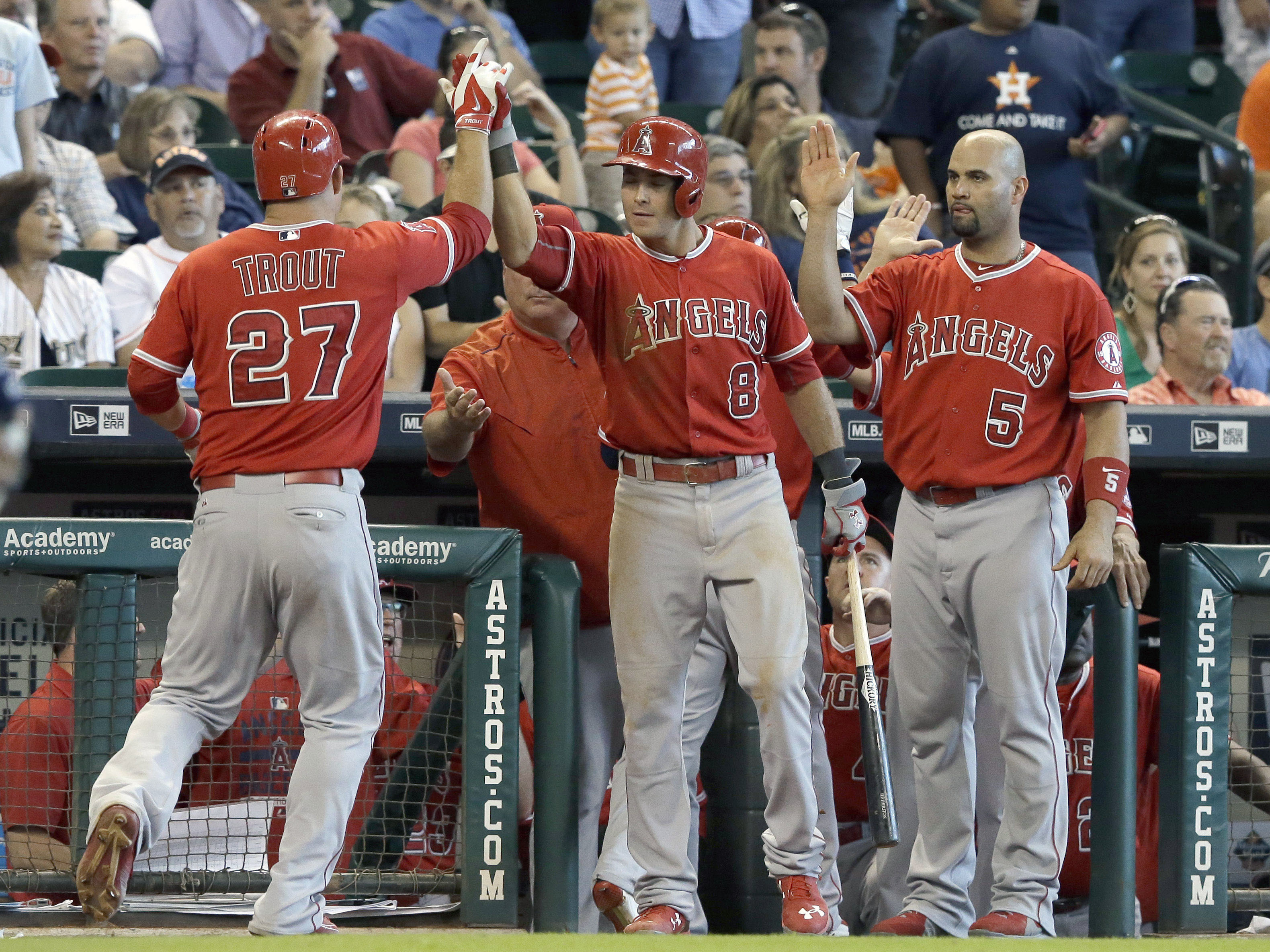 Angels rally for 6-5 win over Astros to close wild-card gap