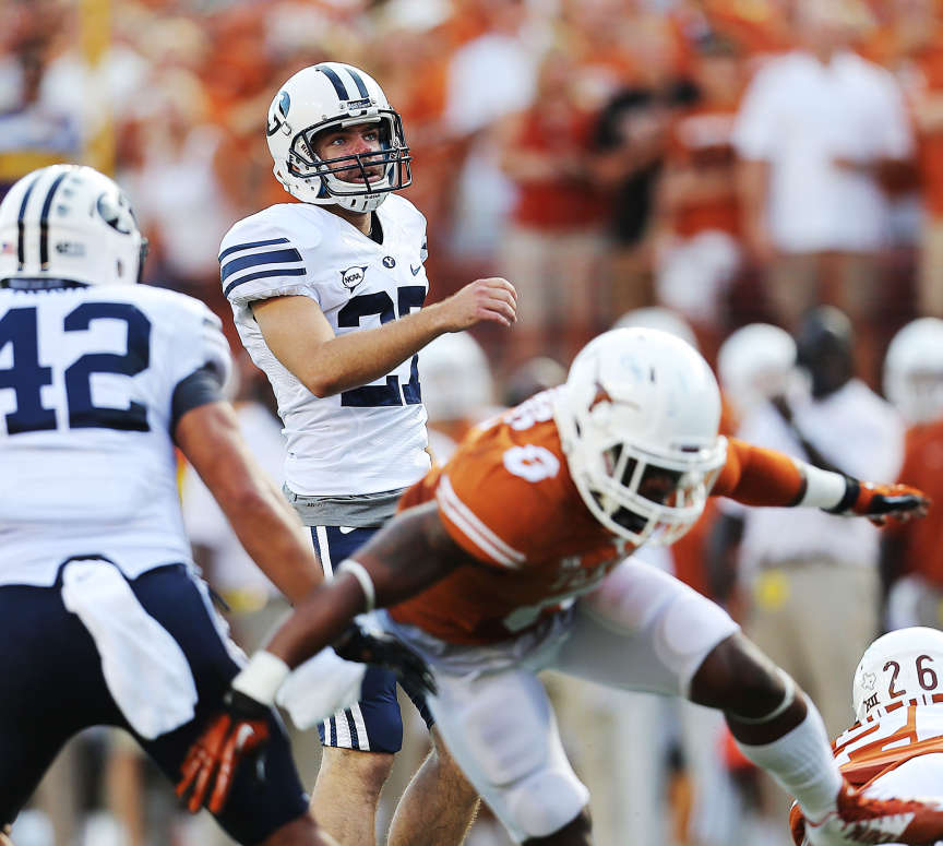 BYU kicker Trevor Samson watches one of his extra points as BYU and Texas play Sept. 6, 2014, in Austin, Texas. (Photo: Scott G Winterton, Deseret News)