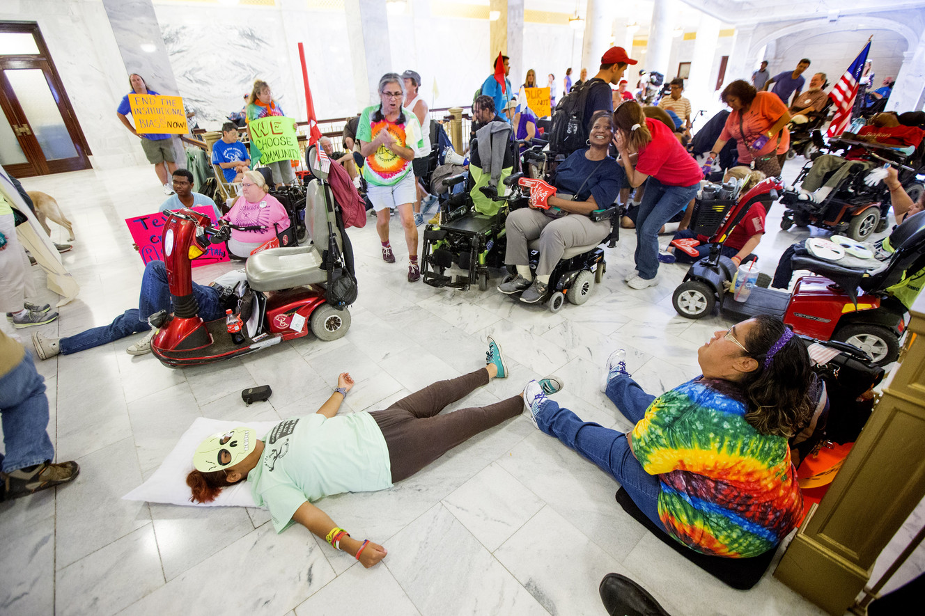 Disability rights group stages protest outside governor's office