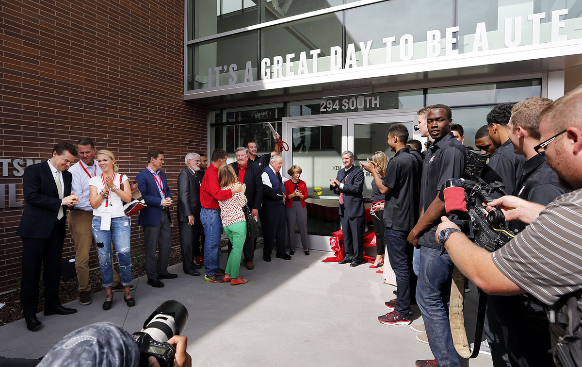 Dignitaries participate in a ribbon cutting during the opening of the Jon M. and Karen Huntsman Basketball Facility at the University of Utah in Salt Lake City, Thursday, Oct. 1, 2015. (Photo: Ravell Call/Deseret News)