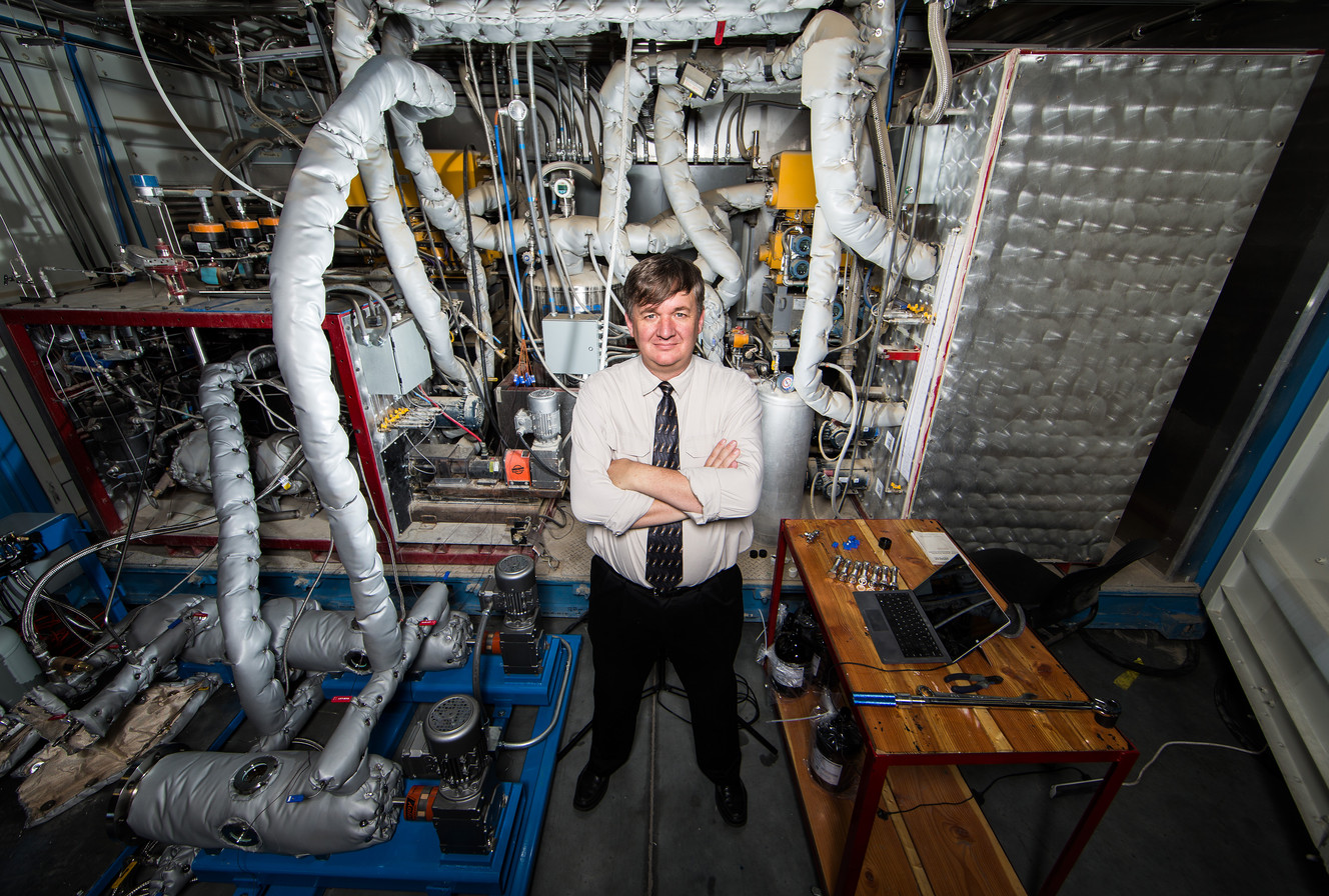 Larry Baxter stands in front of his cryogenic carbon capture technology. (Photo: Jaren Wilkey/BYU)