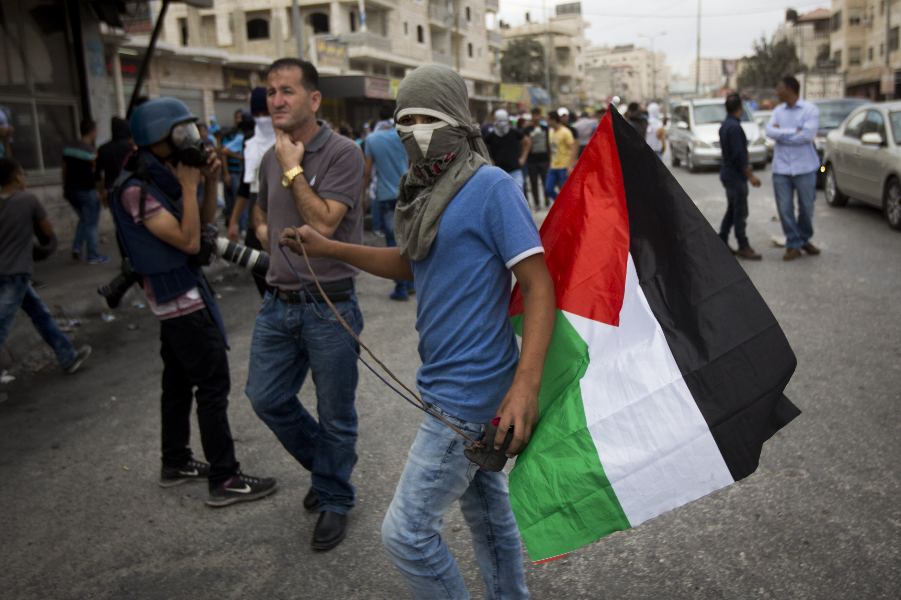 The Latest: Israeli police shoot driver who attempted attack