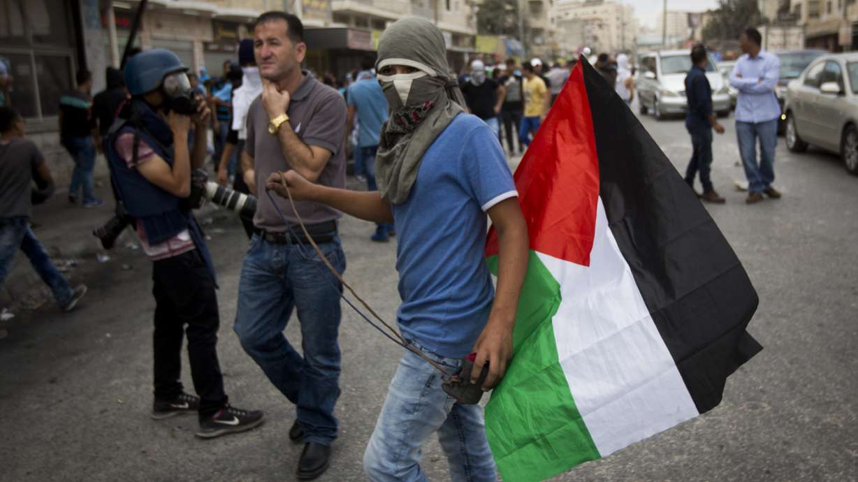 The Latest: Israeli police shoot driver who attempted attack