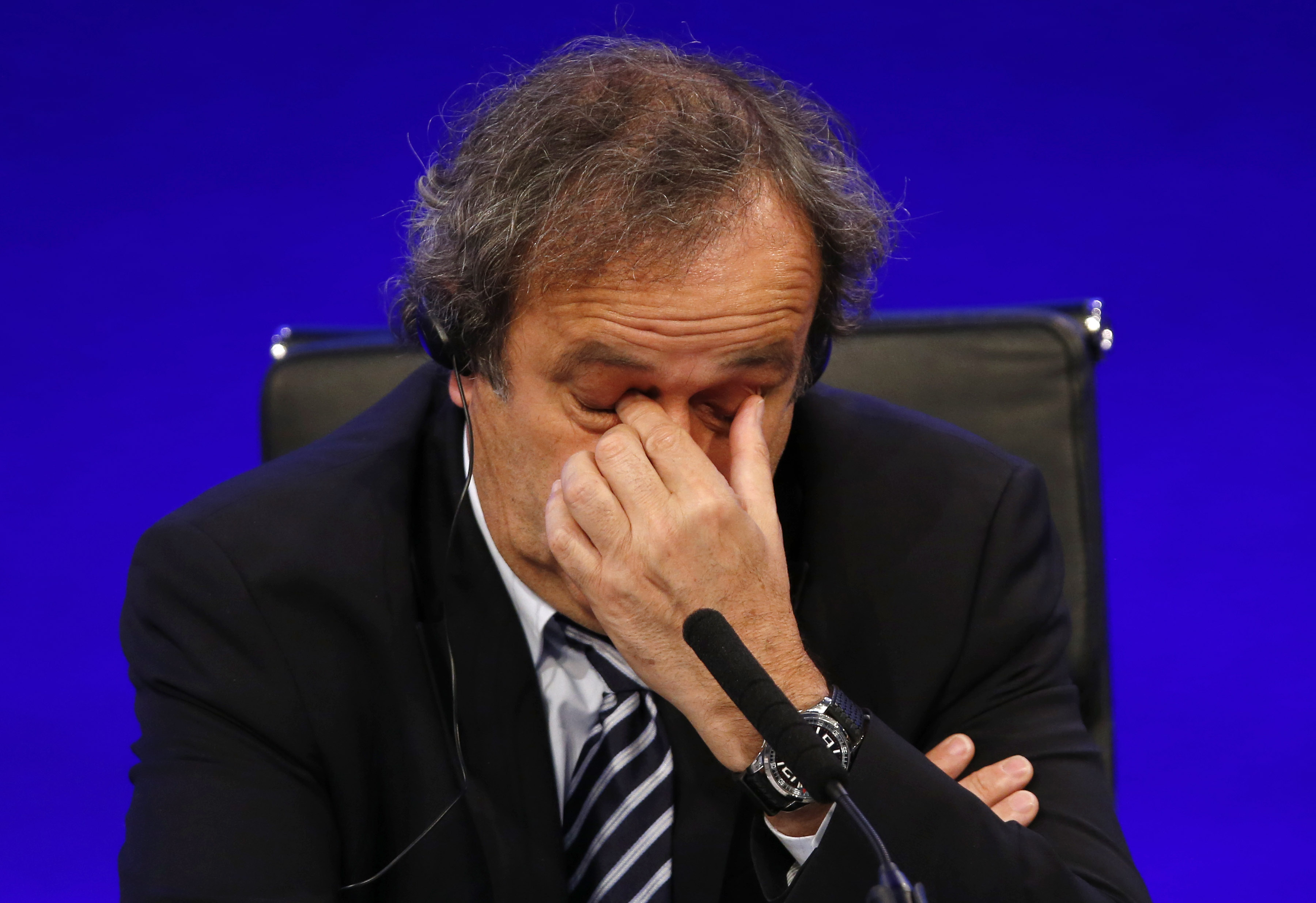 Platini retains UEFA title, with no interim leader in place