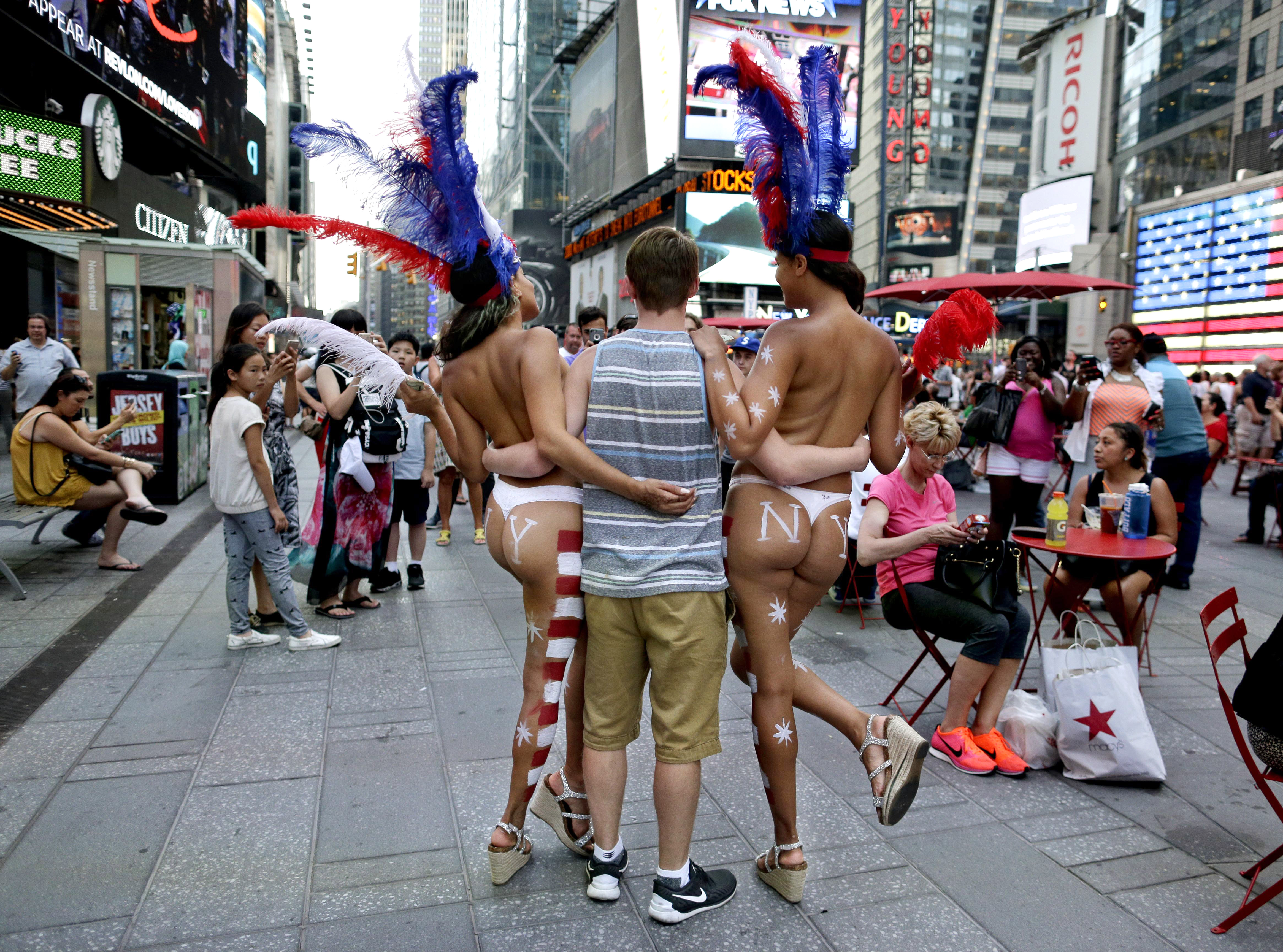 Topless women of Times Square say they can't be restricted