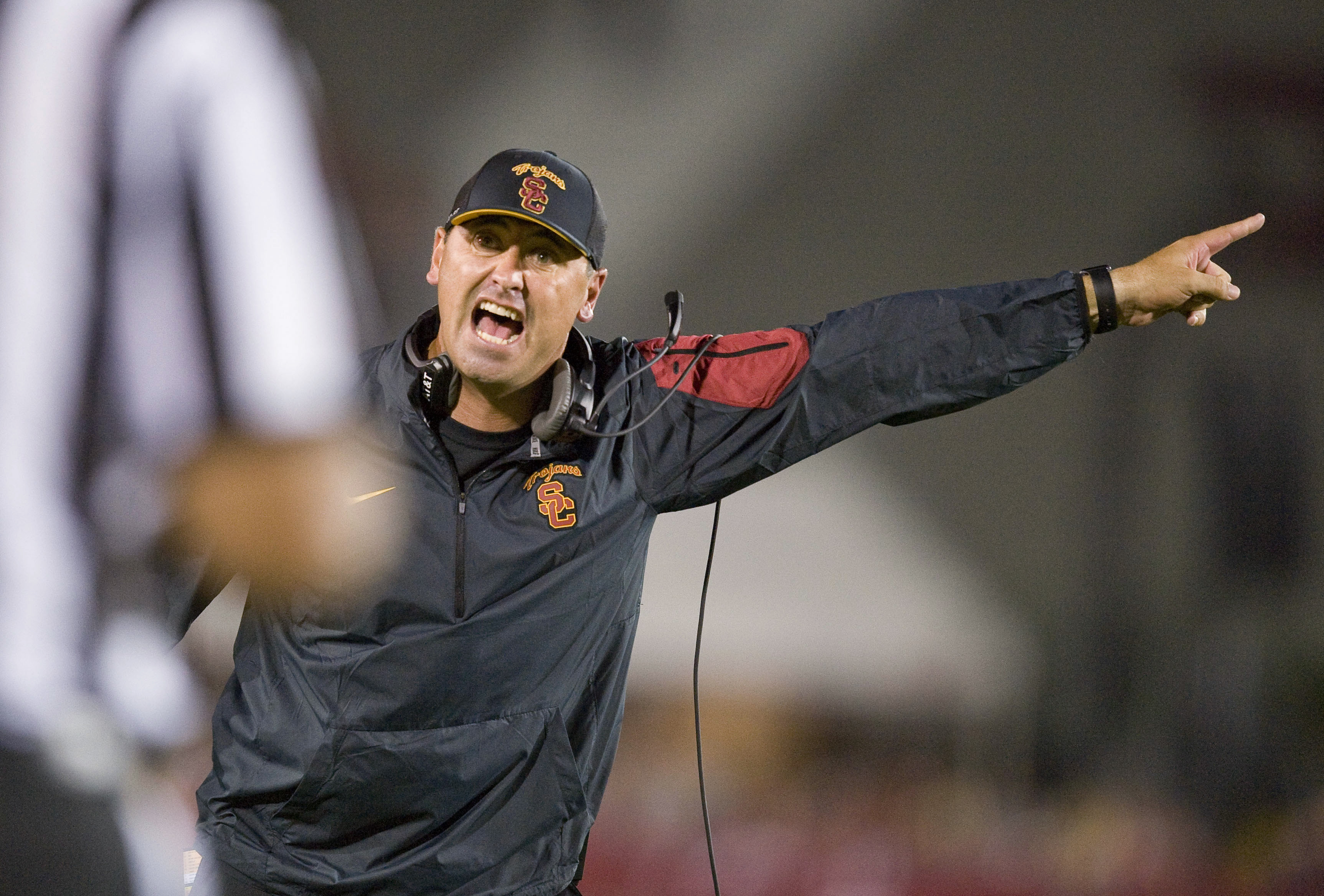 USC coach Steve Sarkisian yells at an official late in the fourth quarter against Washington during an NCAA college football game, Oct. 8, 2015, in Los Angeles. Sarkisian, a former BYU quarterback, was fired this year. (Paul Rodriguez/The Orange County Register via AP)